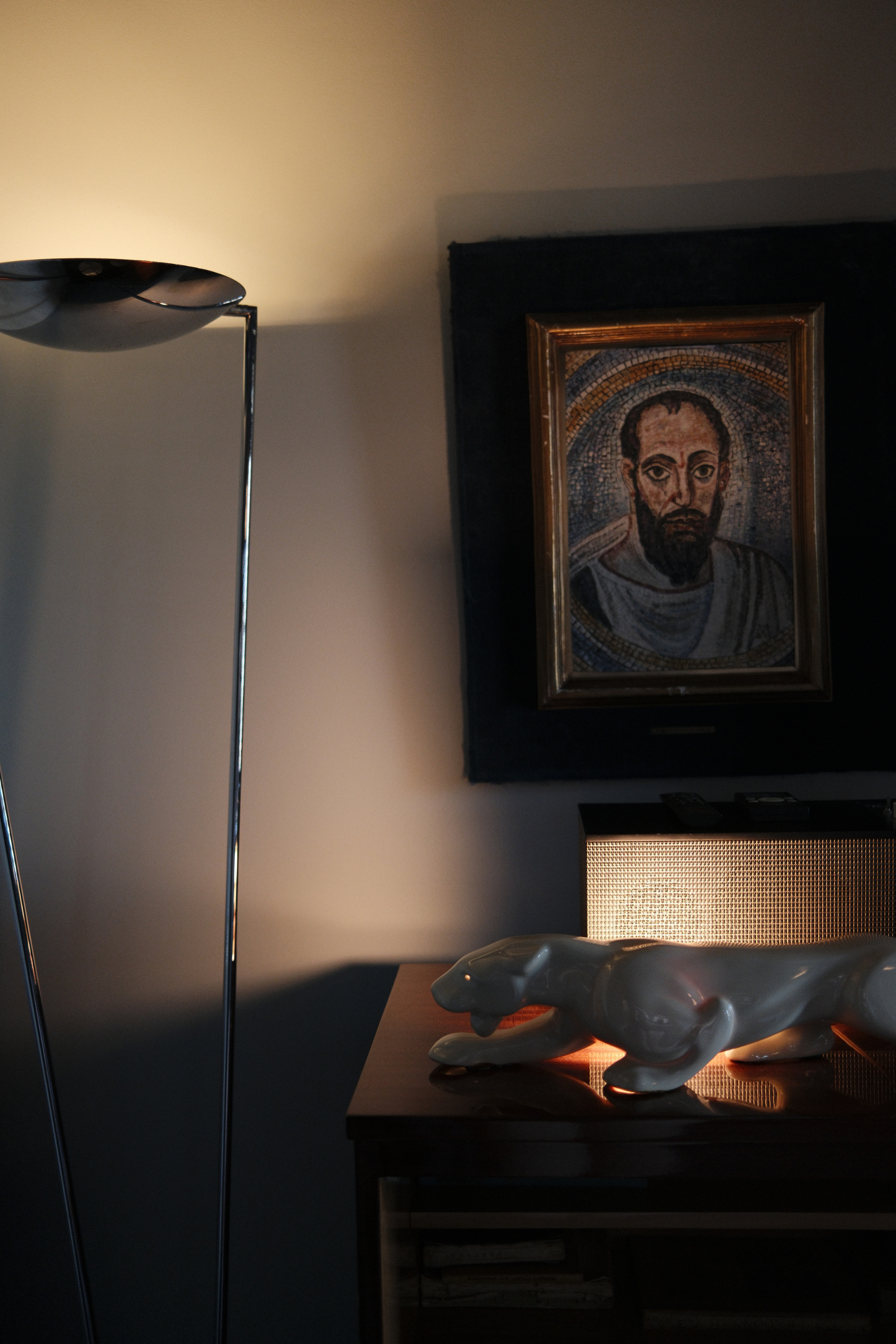 Dasher Suite detail of floor lamp, painting, and decor