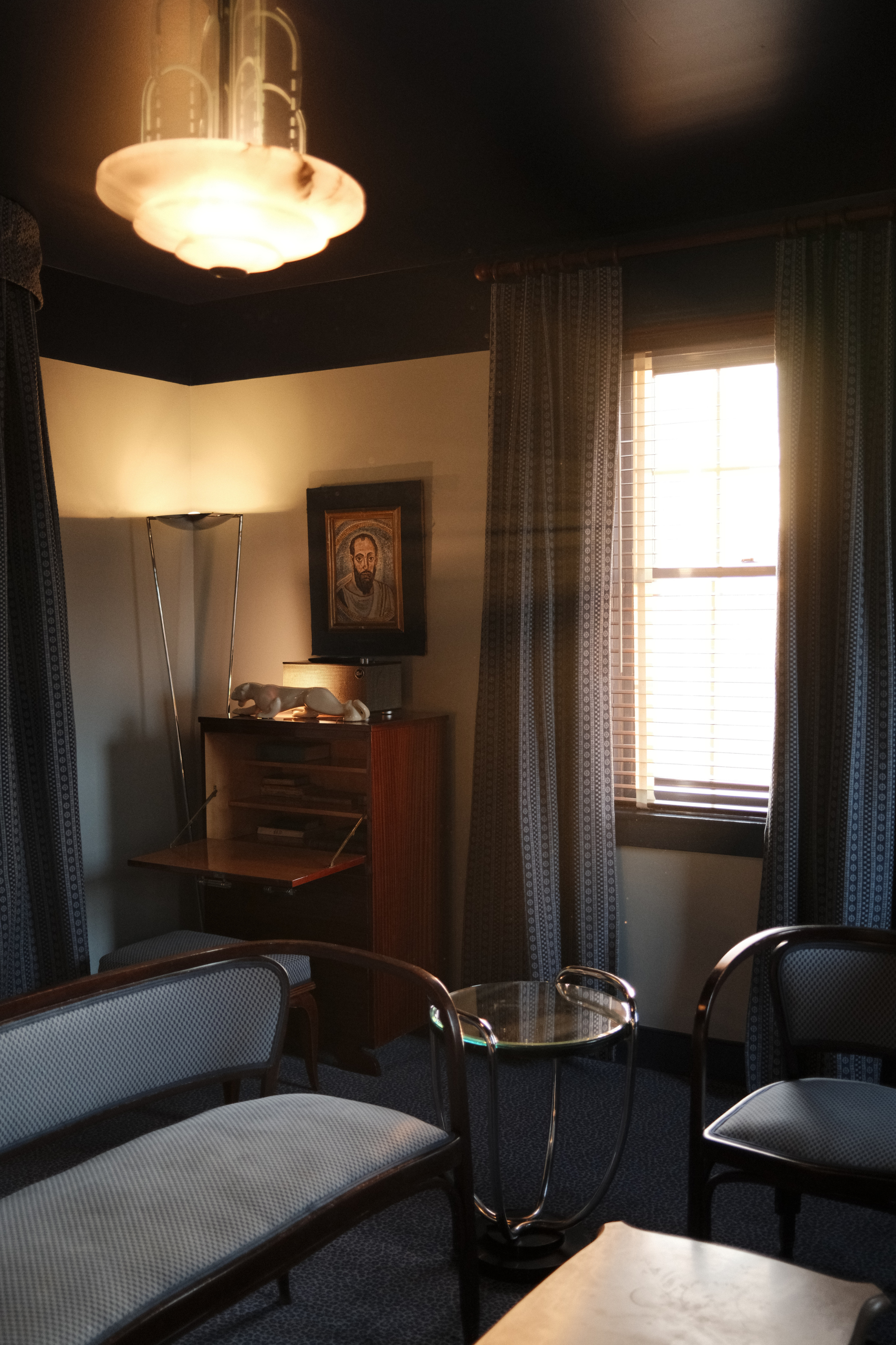 Dasher Suite living room at sunset with light streaming through the window