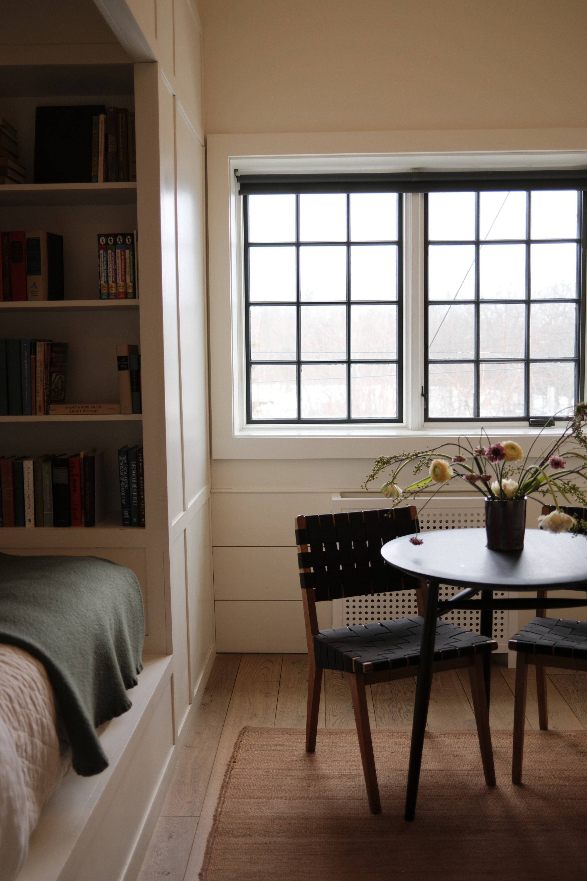 Guest room with flowers on a table