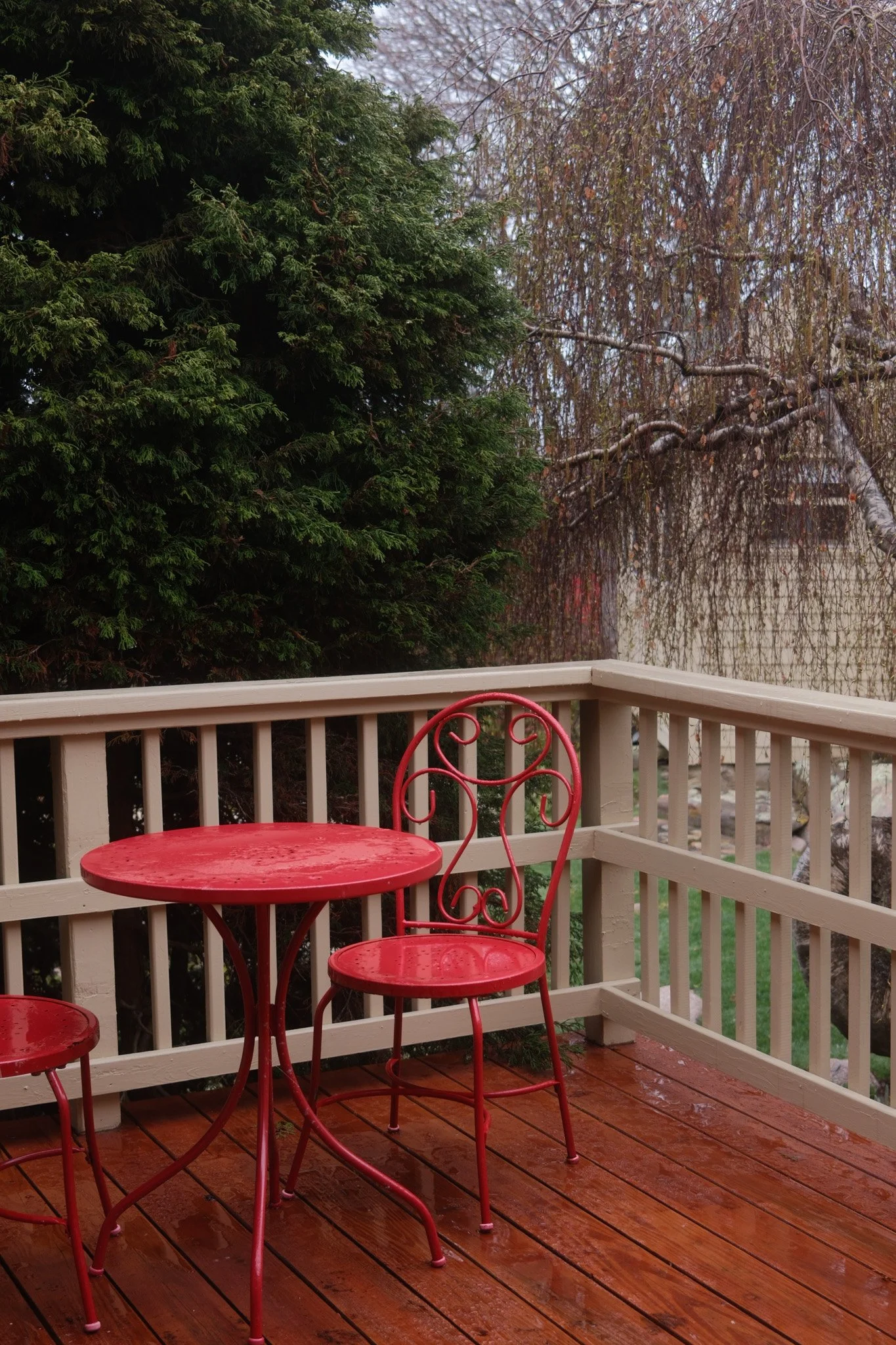 Red table and chairs on deck