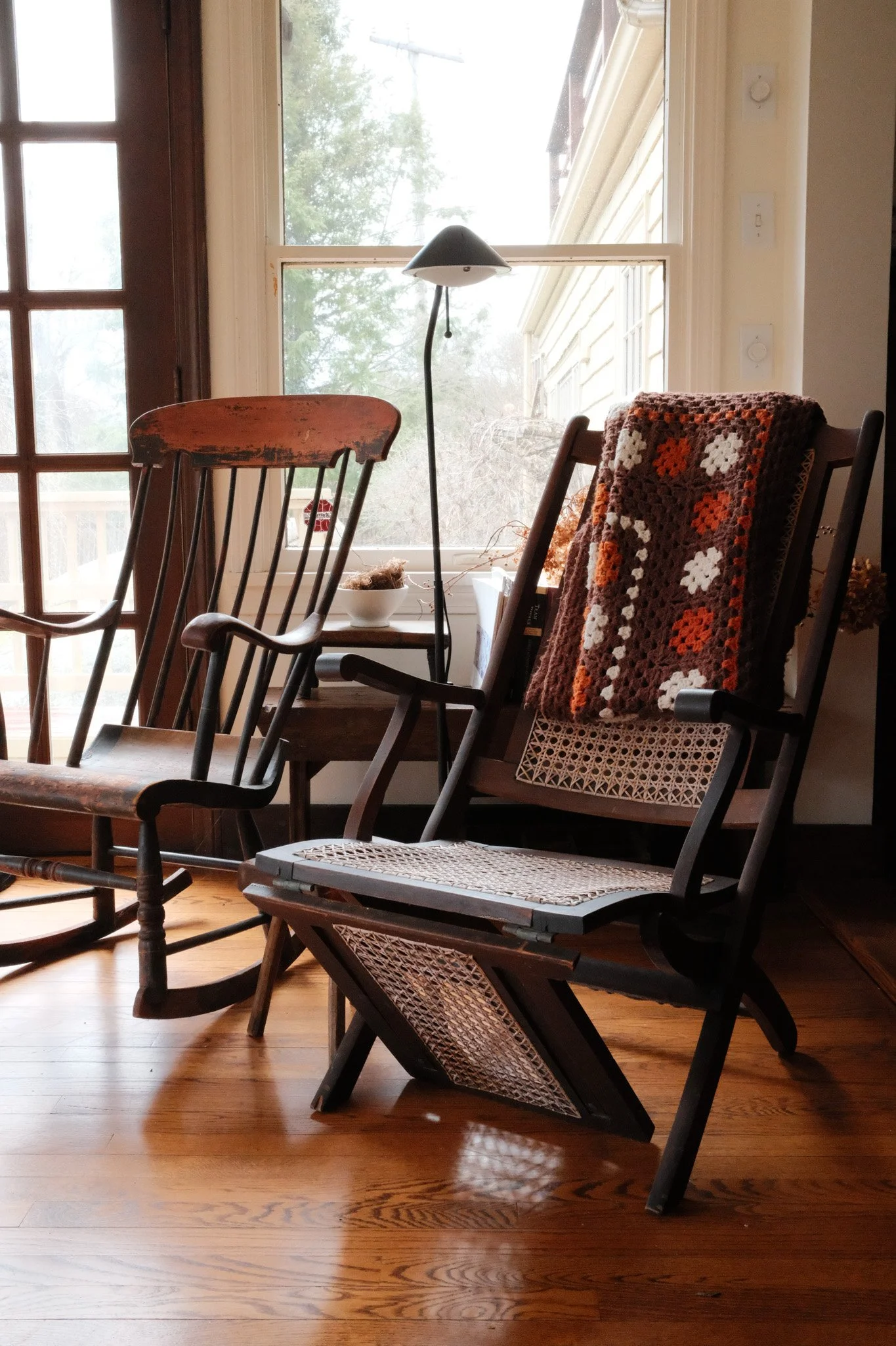 Two antique chairs with blanket
