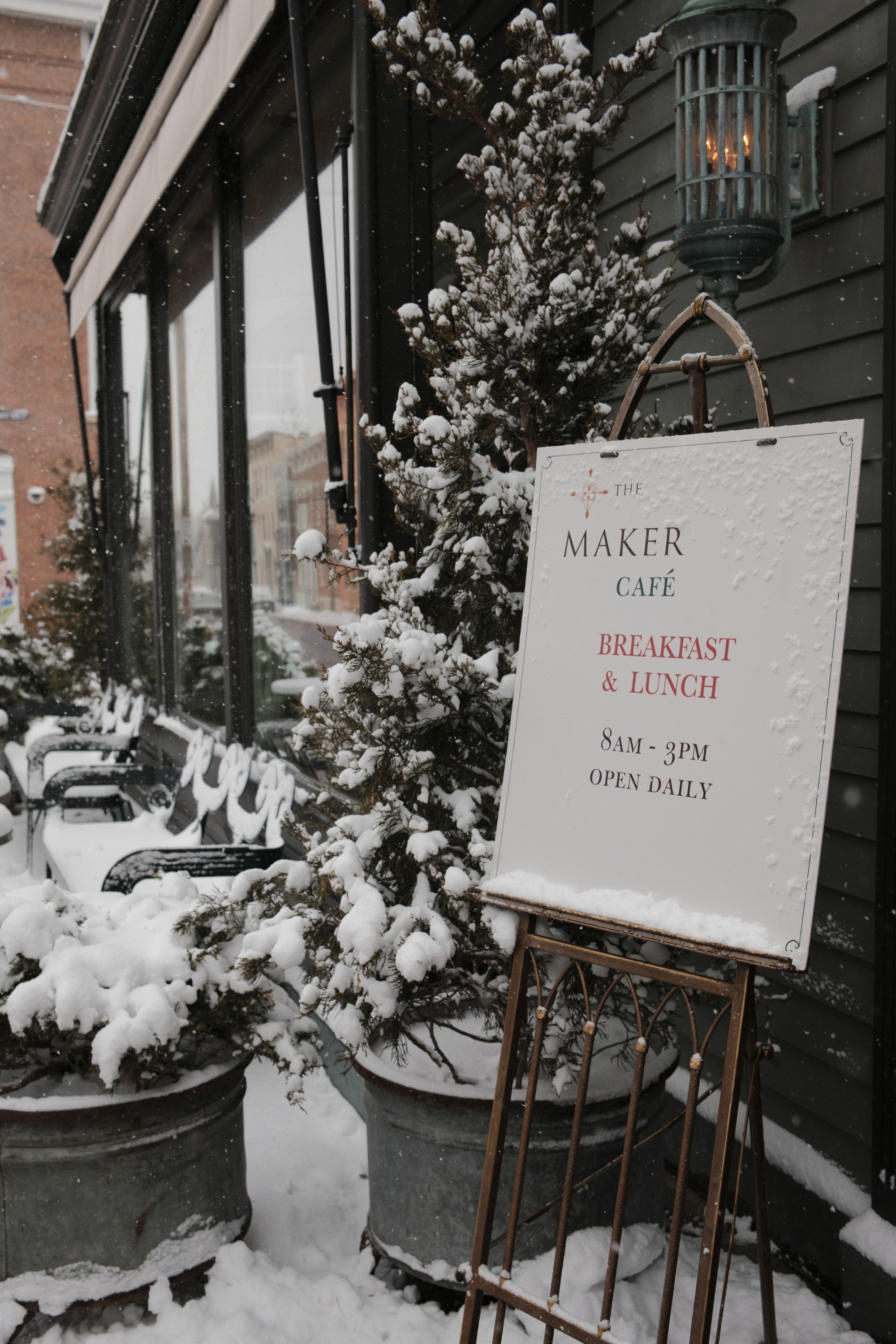 The Maker Cafe sign in the snow