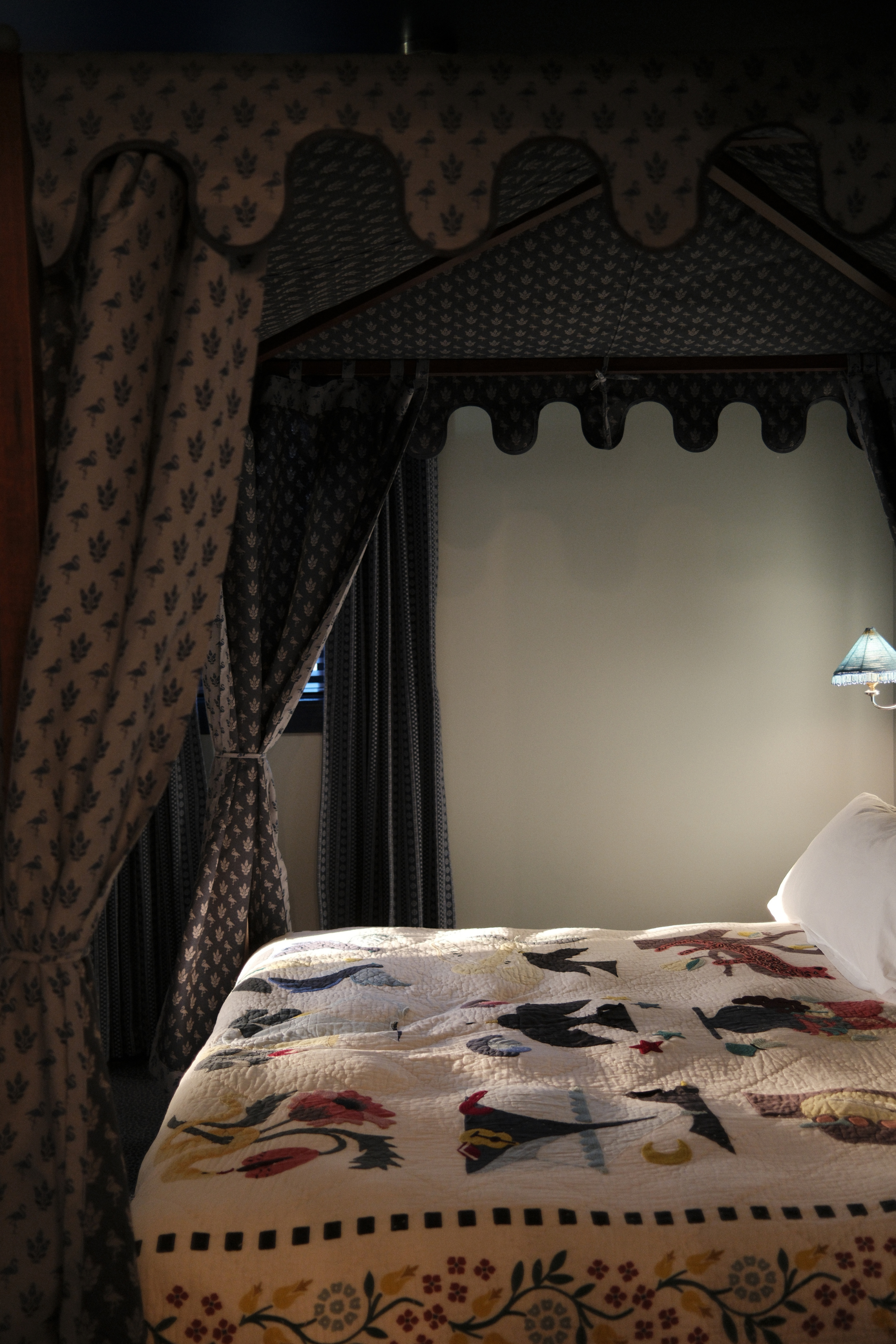 Guest room bed with canopy
