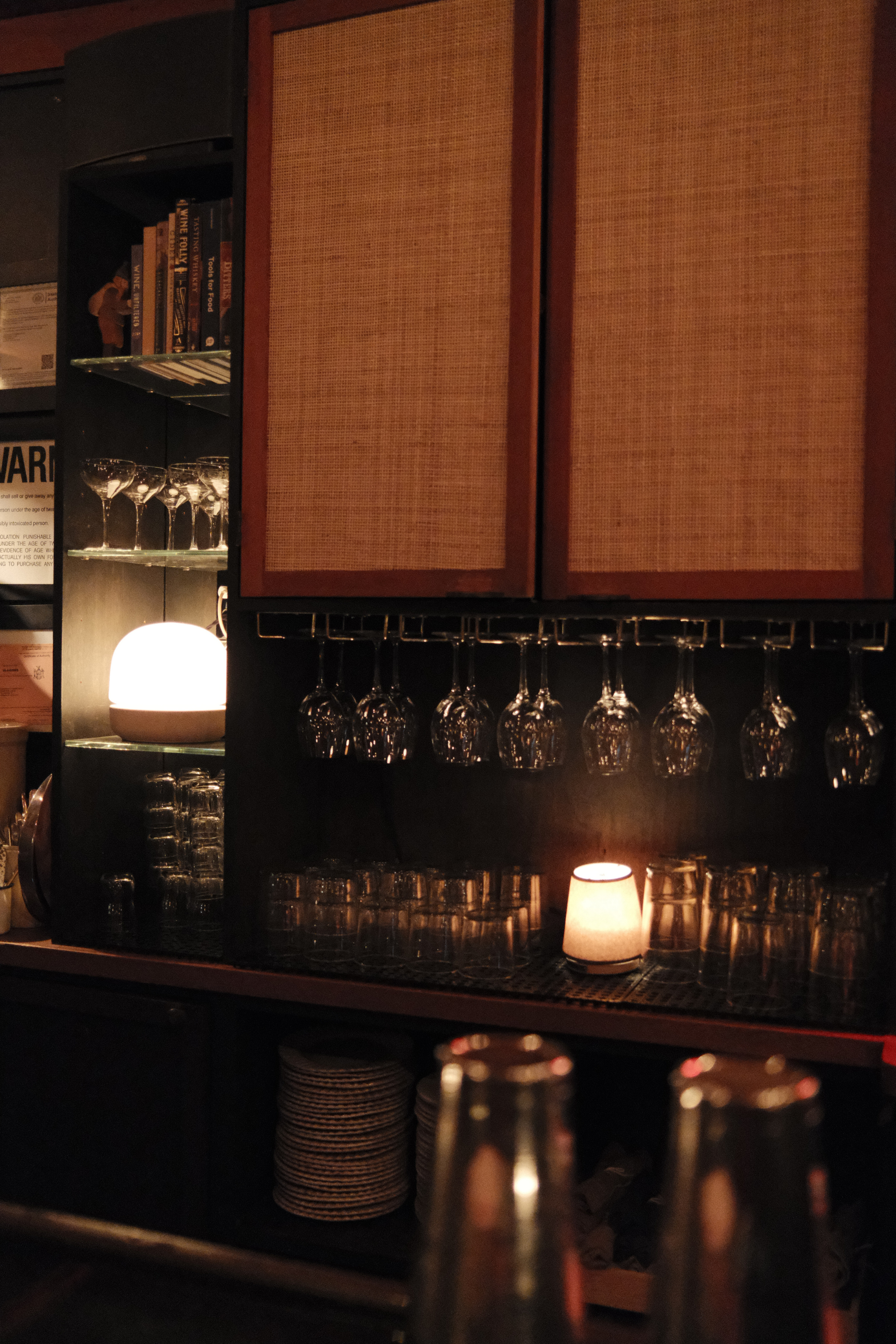 Bar cabinet with hanging wine glasses