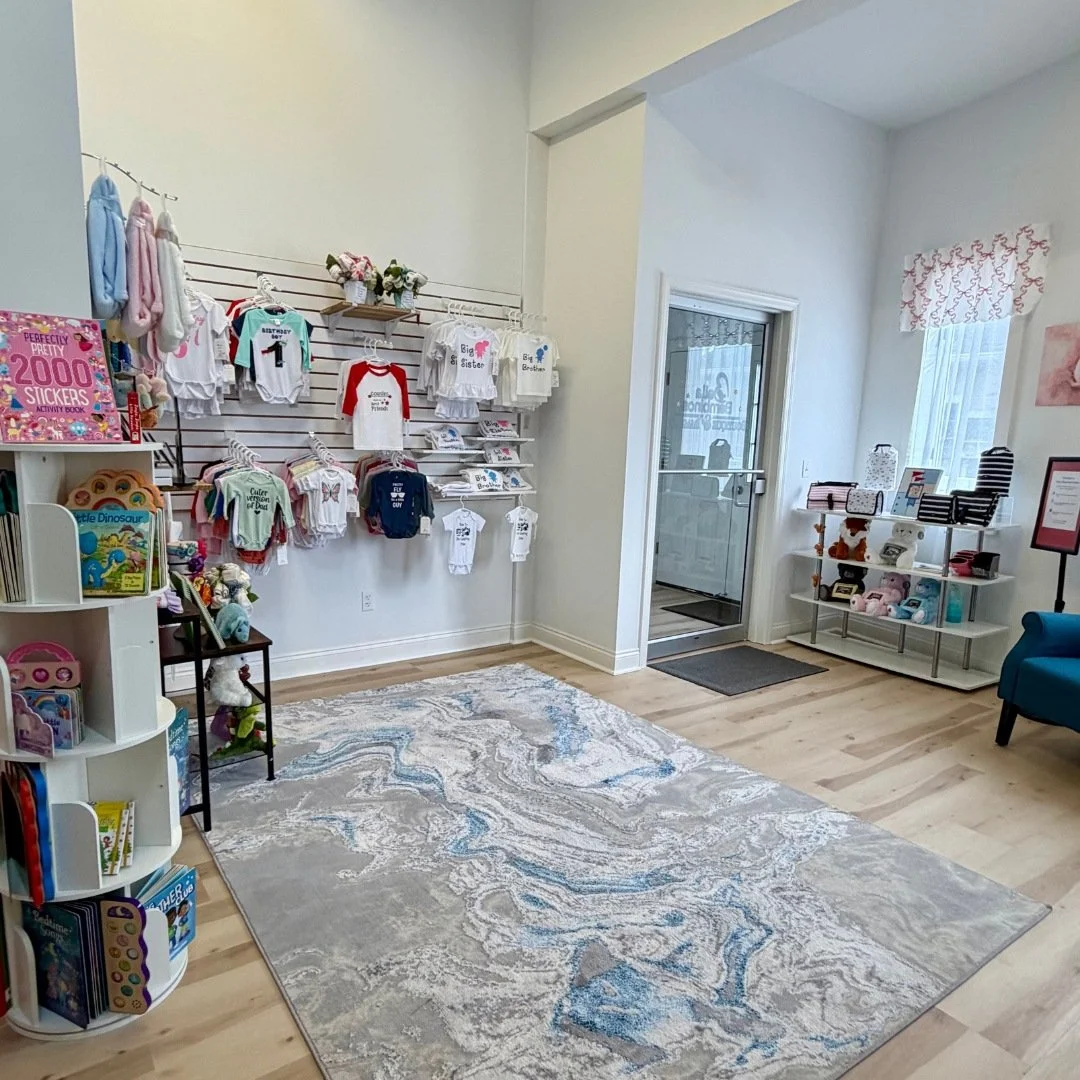 Bella Bambinos boutique featuring baby gifts, keepsakes, and pregnancy accessories.