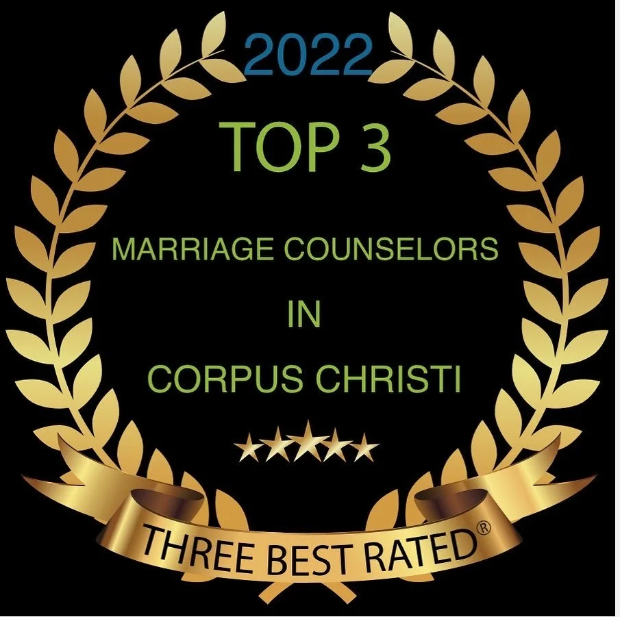 Gold laurel wreath with text inside recognizing the top three marriage counselors in Corpus Christi for 2022, rated as three stars, with a gold ribbon at the bottom reading "Three Best Rated".