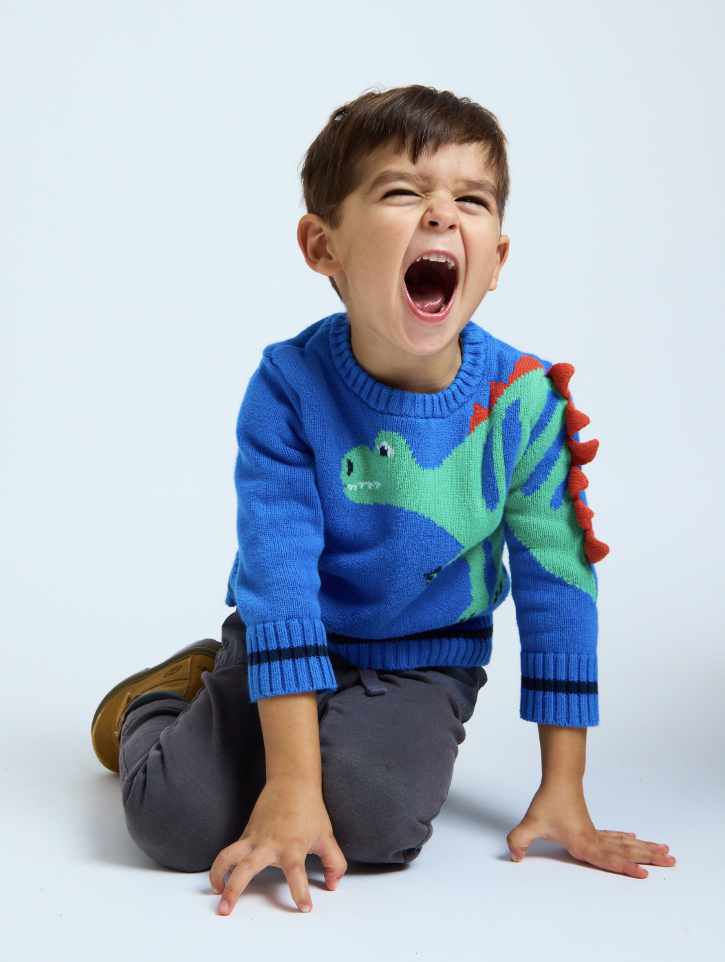 boy roaring and laughing during kids portrait mini session Brooklyn NYC