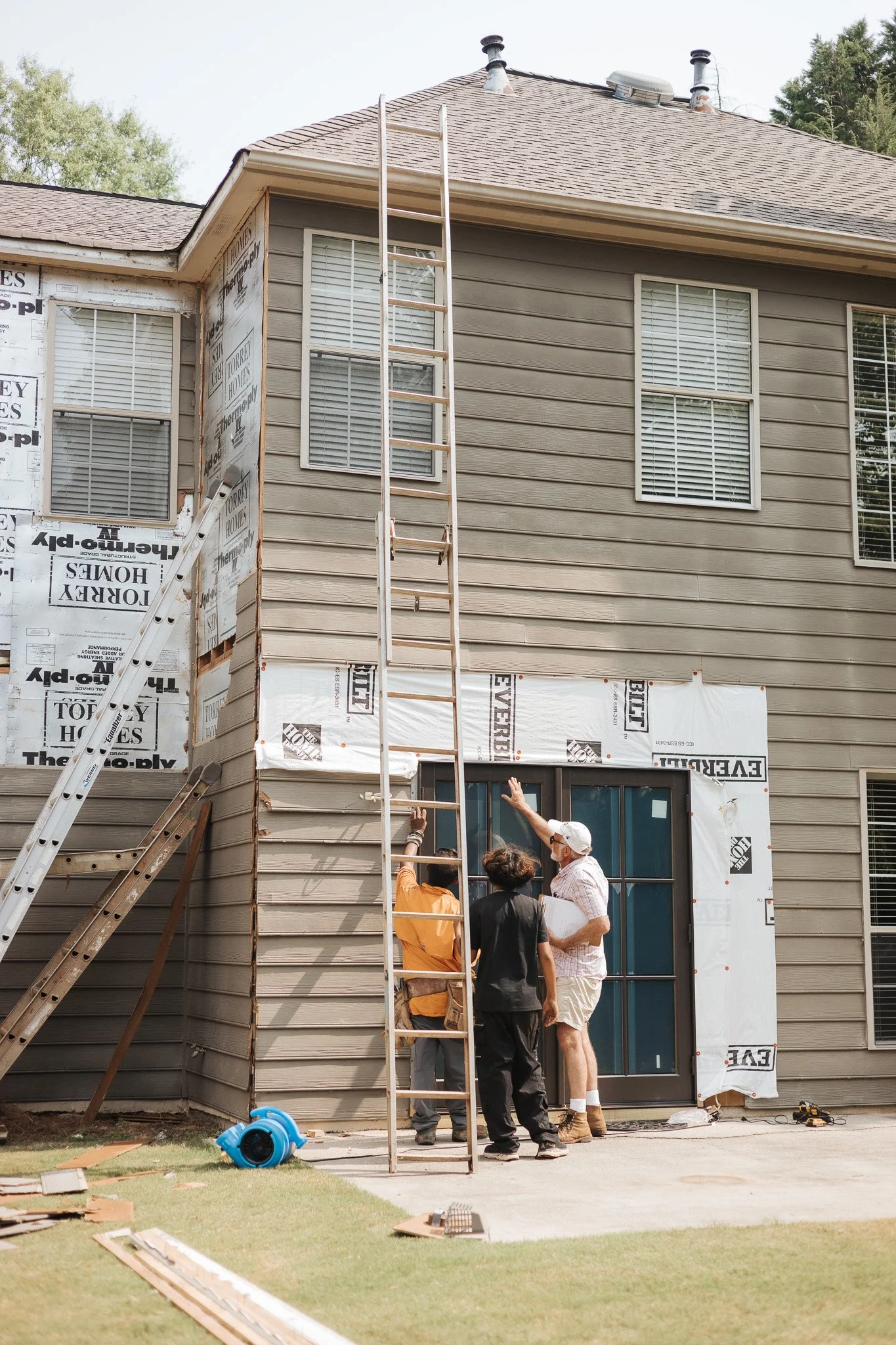 John Temmel with expert crew replacing siding on a home in Alpharetta, GA
