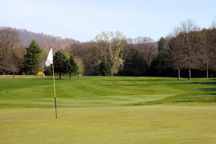 #17: A medium length par 4 with a well guarded, small, and difficult green. Original Donald Ross Hole