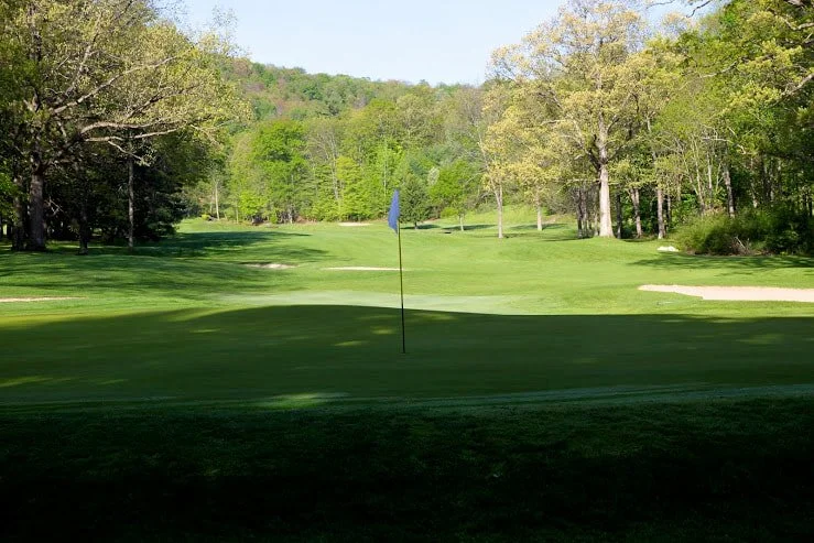 #9: A medium length, downhill par 5 with another treacherous green. Original Donald Ross Hole