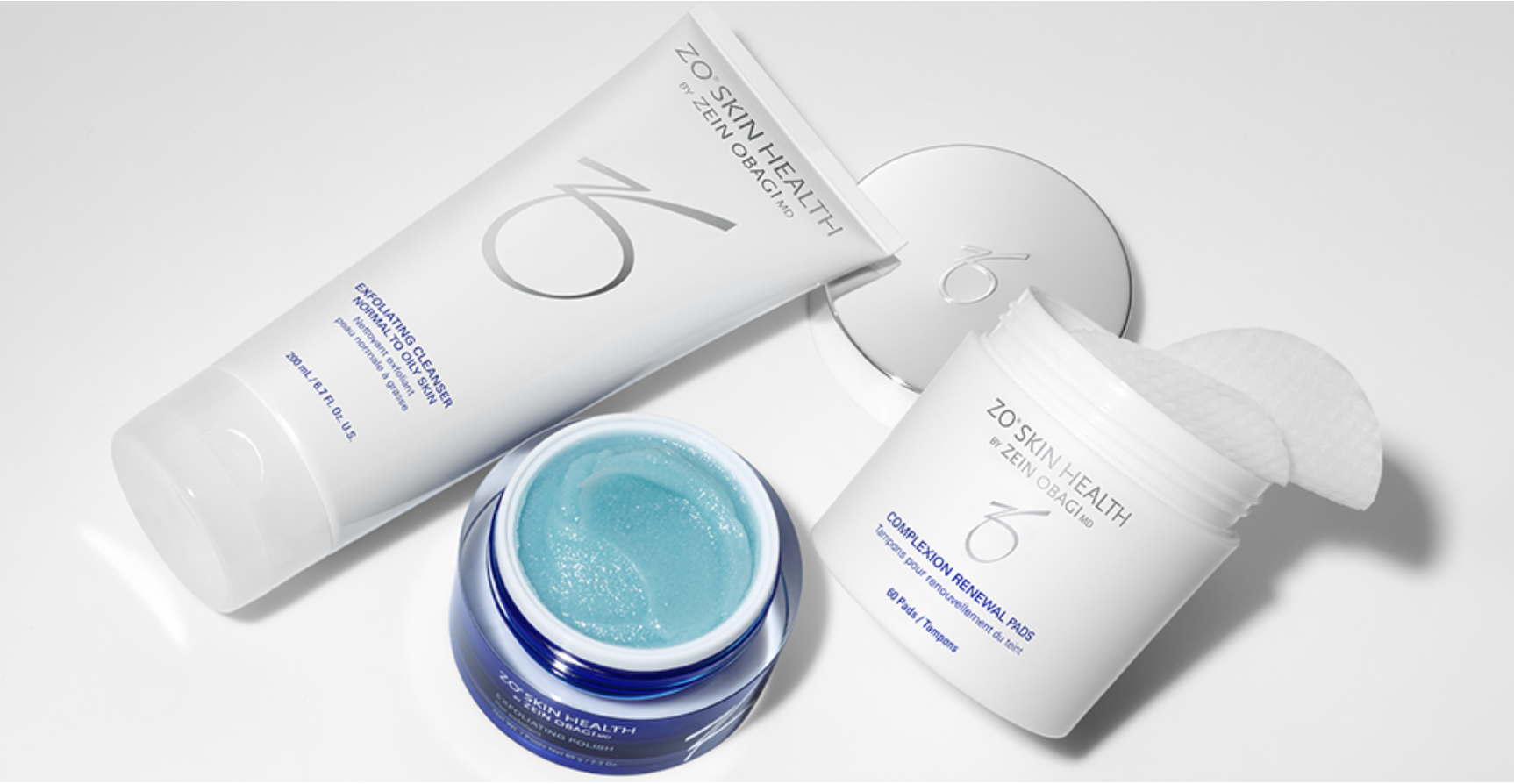 ZO Skin Health skincare products - the Getting Skin Ready lineup includes a tube, a jar, and a container with pads on a white surface.