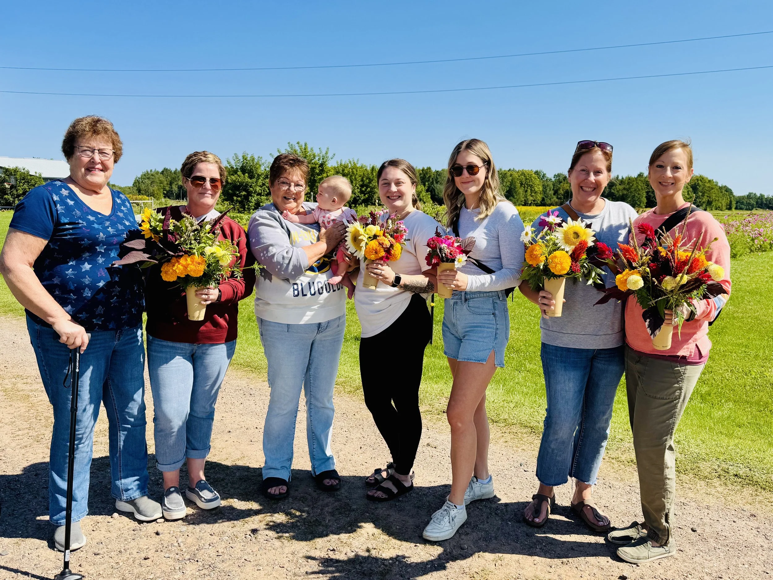 Happy u-pick visitors at Northern, WI flower farm in Phillips, WI