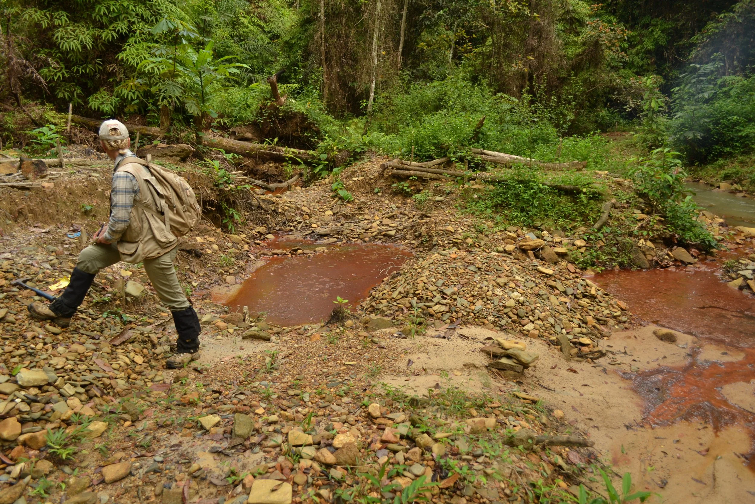 Danae Voormeij, professional geologist, investigating artisanal gold workings in Liberia