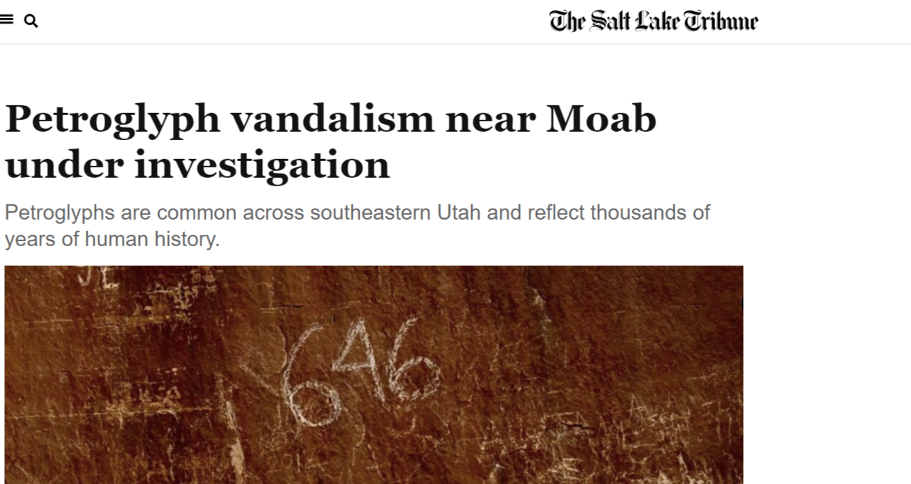 Screenshot of a news article titled 'Petroglyph vandalism near Moab under investigation' from The Salt Lake Tribune, showing a close-up of a rock with white paint or chalk markings and carved petroglyphs.