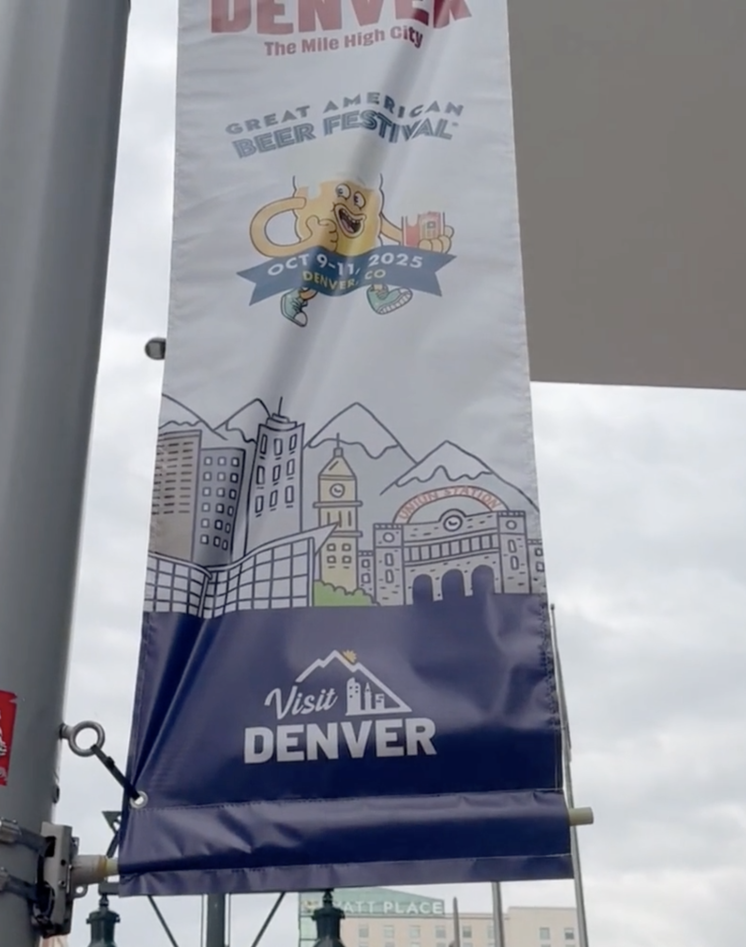 GABF 2025 street banner in downtown Denver featuring Great American Beer Festival branding by Danvillage illustrator