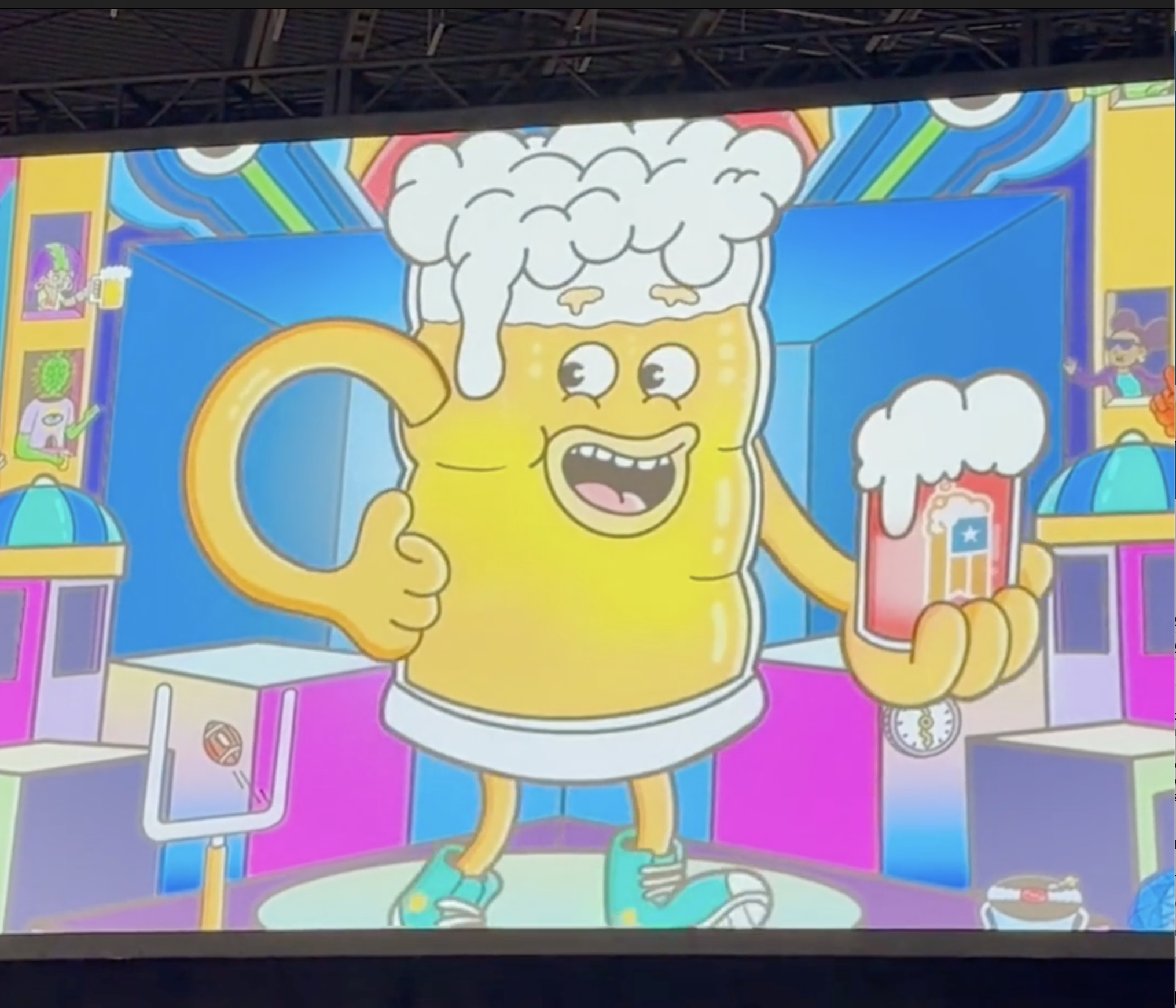 Animated beer mug mascot character from GABF 2025 visual identity by Danvillage displayed on main stage screen at Great American Beer Festival