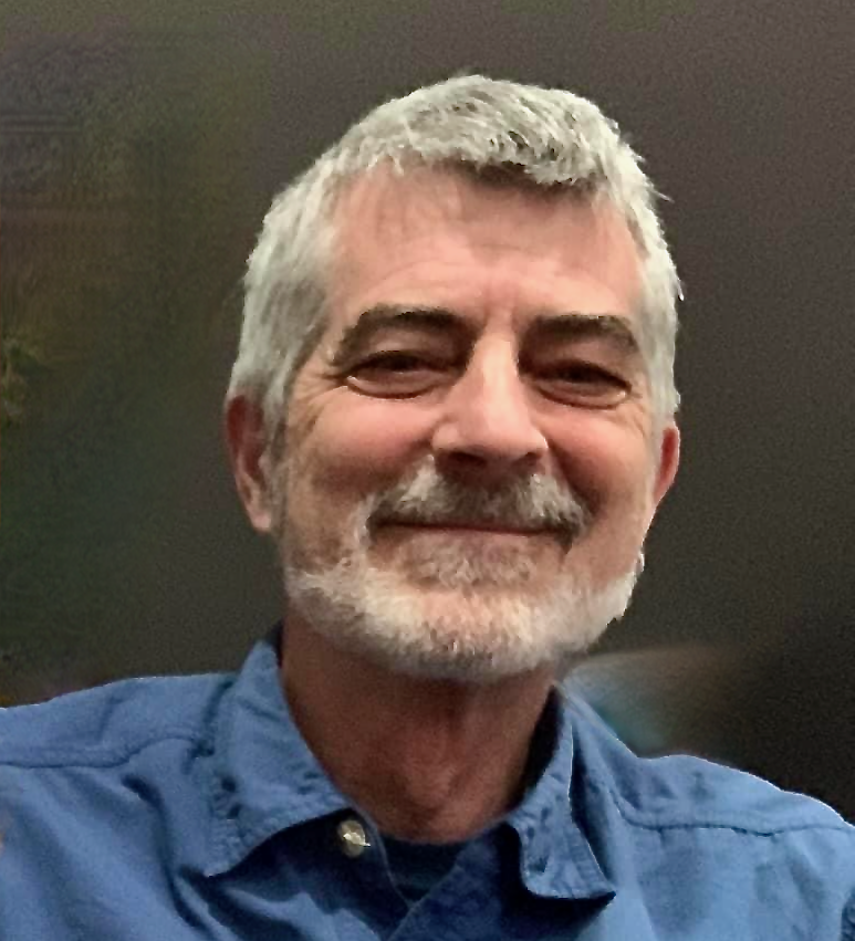 Extremely handsome, obviously intelligent man smiling