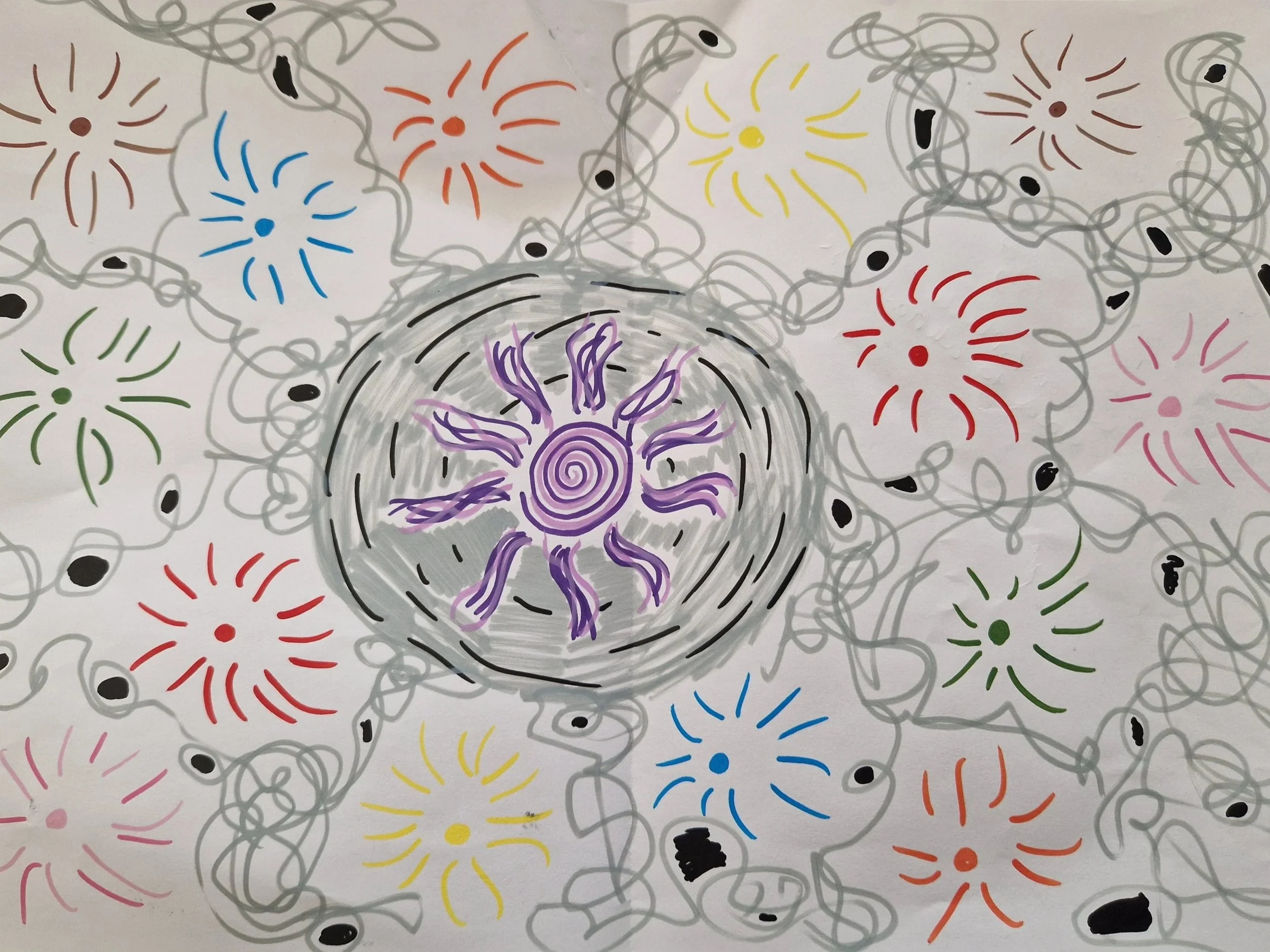 Colorful fireworks illustrated on a white background, featuring various colors such as yellow, red, blue, green, purple, and black, with swirling and looping lines.