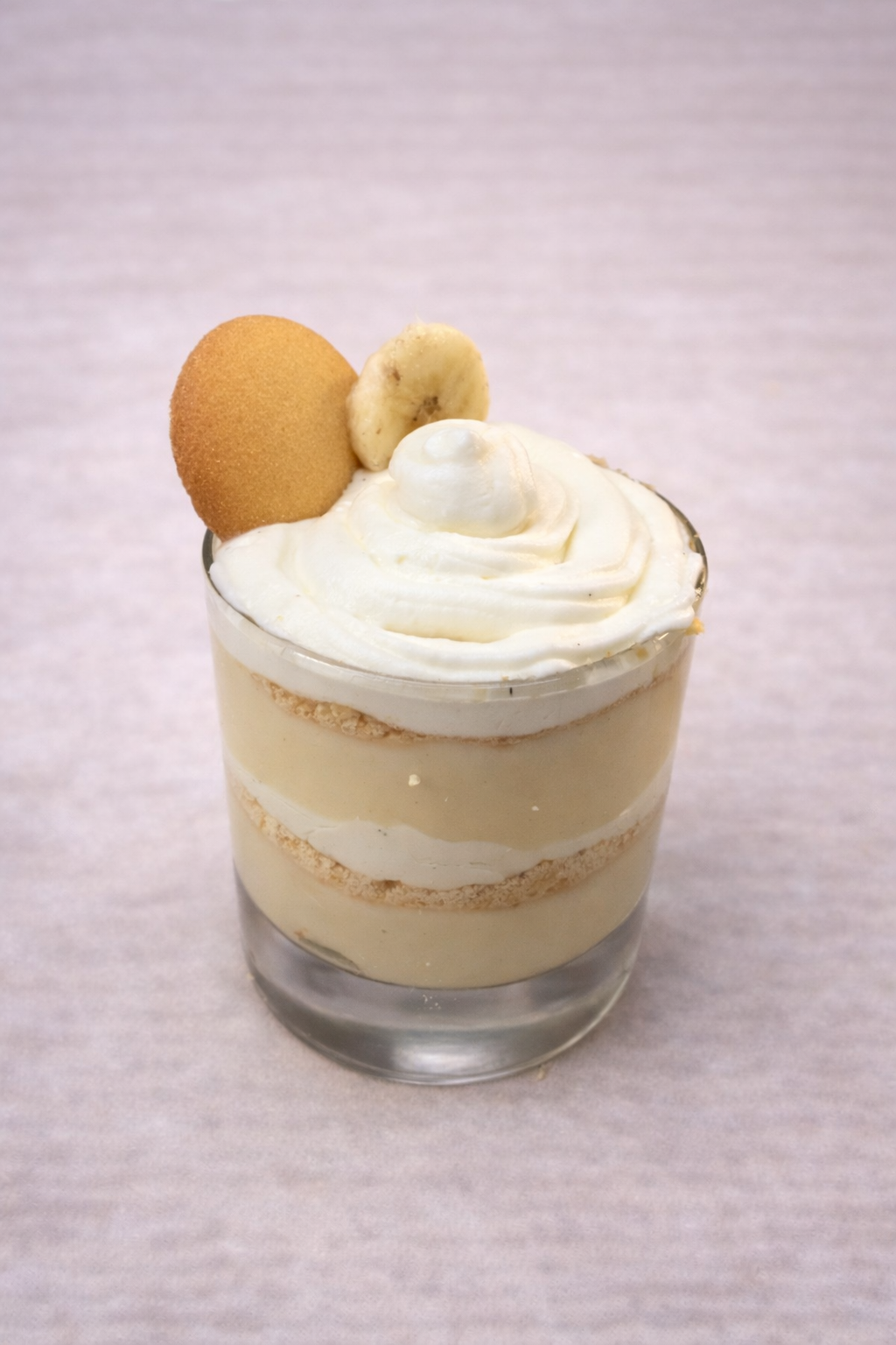 Banana pudding with nilla wafer crumble and whipped cream layers