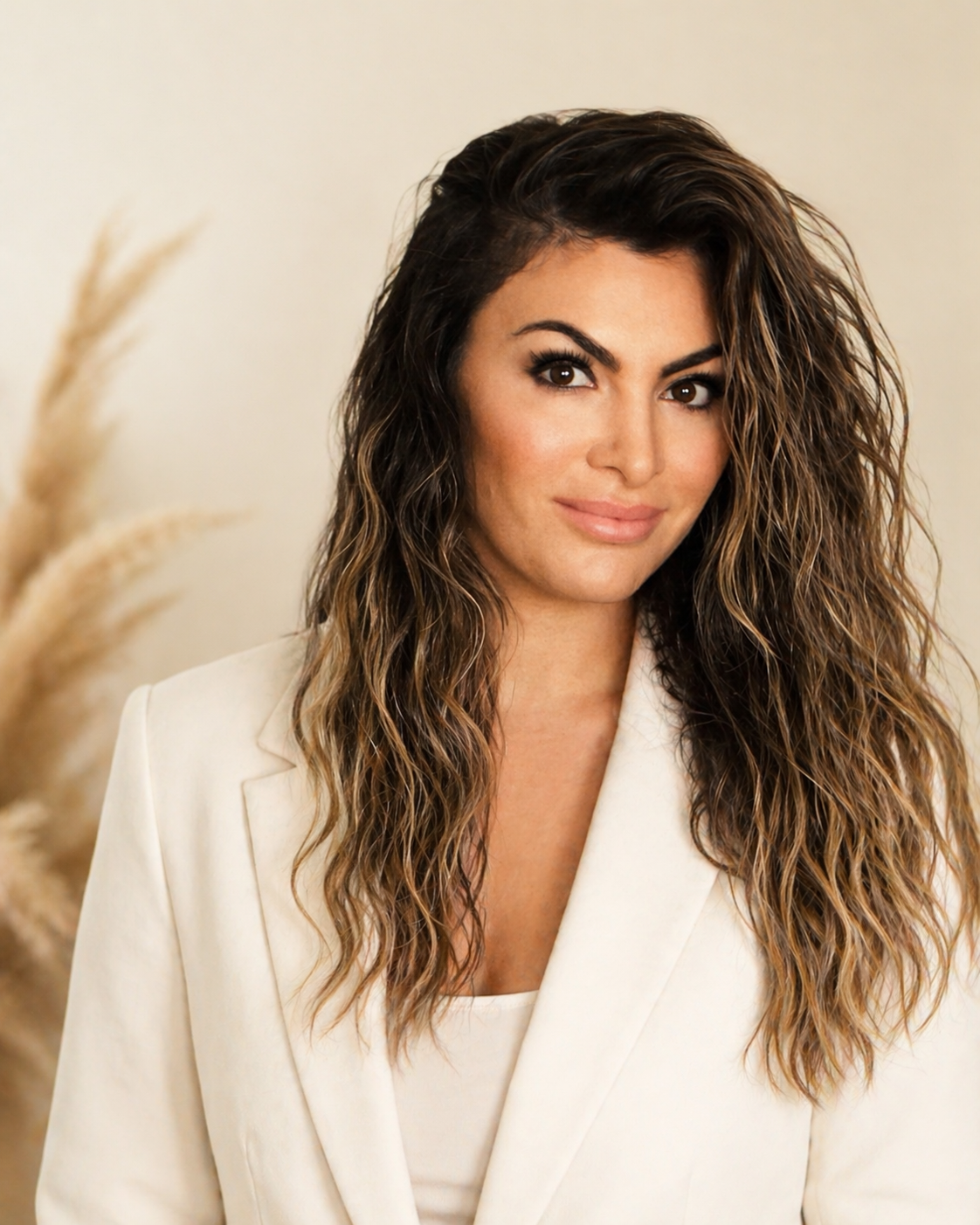 Founder portrait of Meadow Star in white blazer, creator of Wild Beauty Society, beauty brand mentor helping women launch businesses with confidence.