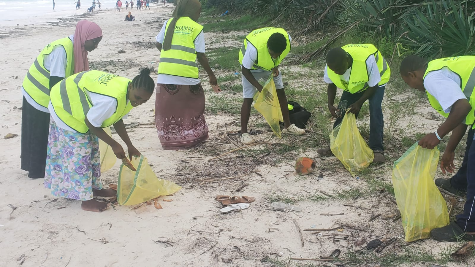 Youth cleaning at the beach