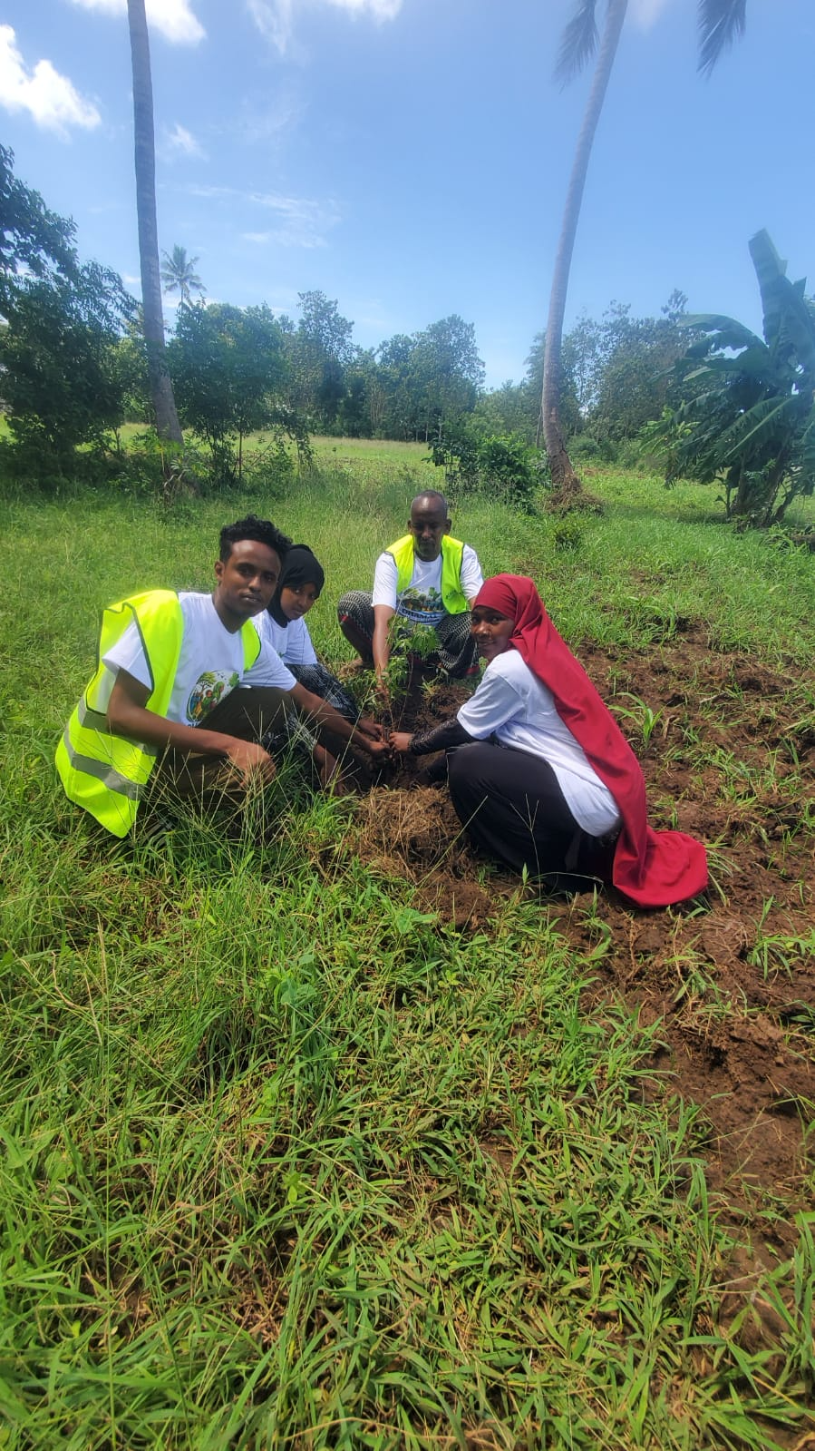 Youth planting trees