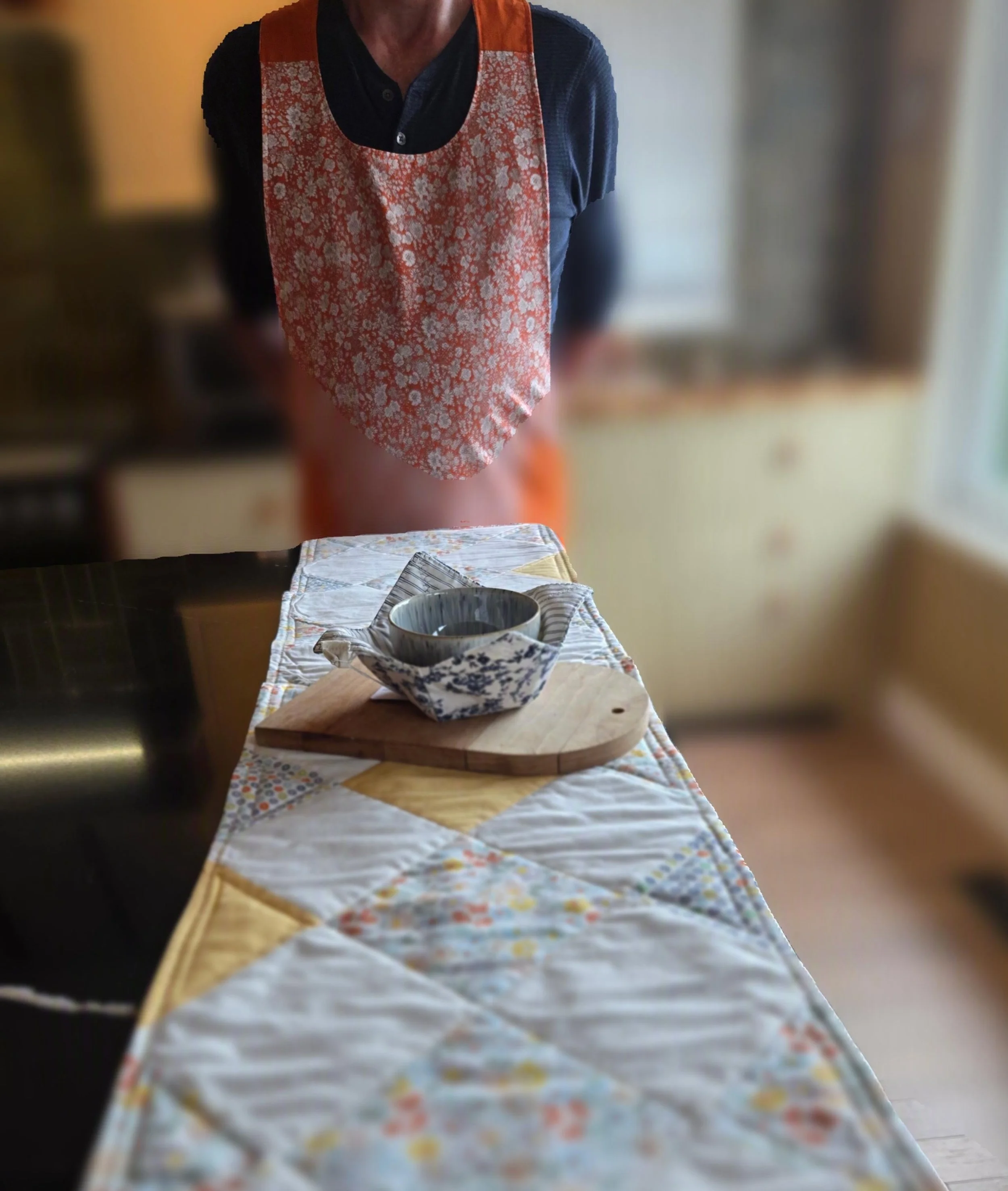 Table runner, bowl cozy and a reversible apron all available from dbfourdesign