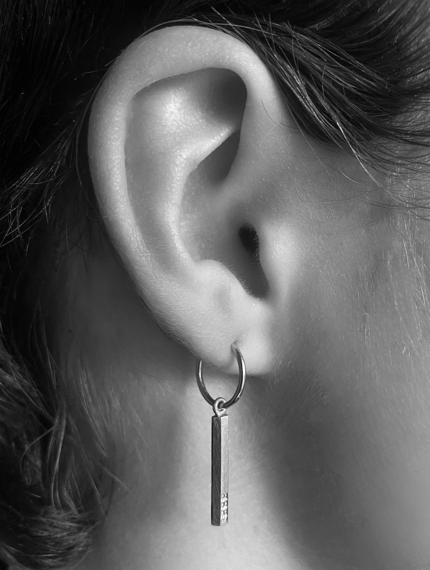 A recent addition to my diamond charm collection, the Profile Diamond Charm Earrings are designed for elevated everyday wear.

Their elongated, bevelled profile is beautiful worn alone or layered with your favourite earrings. Handcrafted in my Melbou