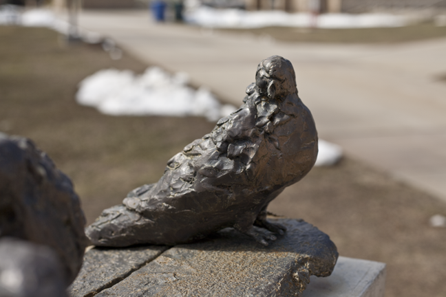Pigeons (detail)
As installed at Burlington County Community College, Pemberton, NJ 2011

Three bronze pigeons on a concrete pedestal, surrounded by concrete pigeons on the ground.