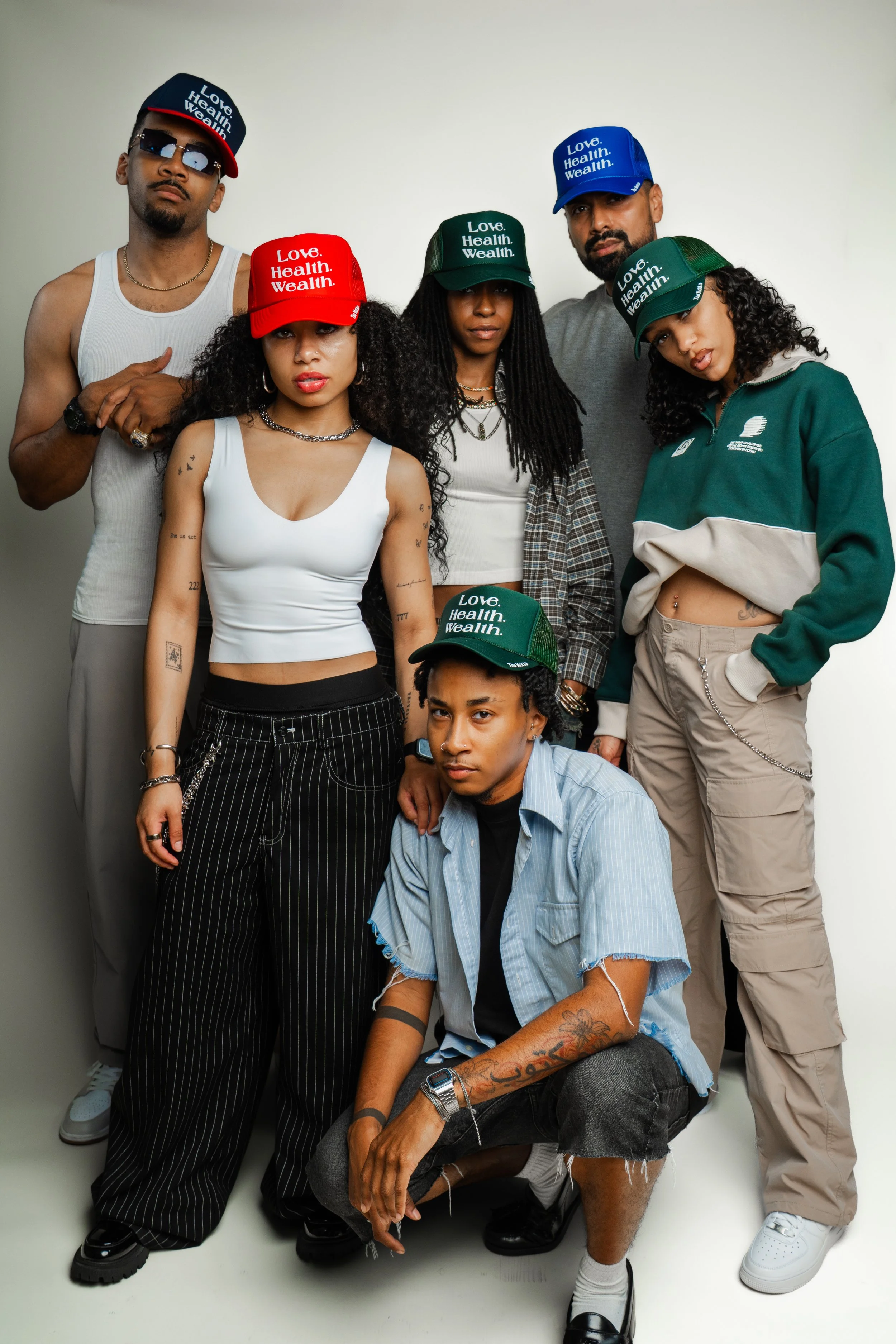 Models wearing BOI Collection hats, unisex streetwear brand promoting self expression