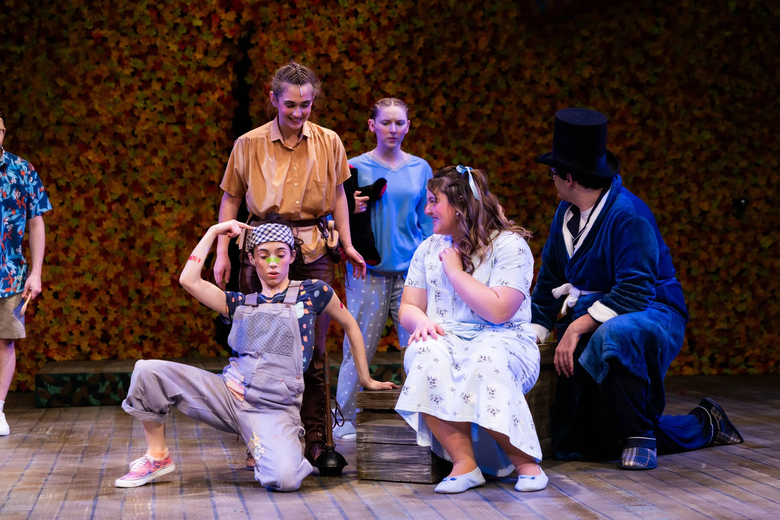 Mariana Marcel as Slightly, Sophia Twohig as Peter, Kayleigh Lauff as Michael, Amy Scraggs as Wendy, and Bryan Covey as Michael