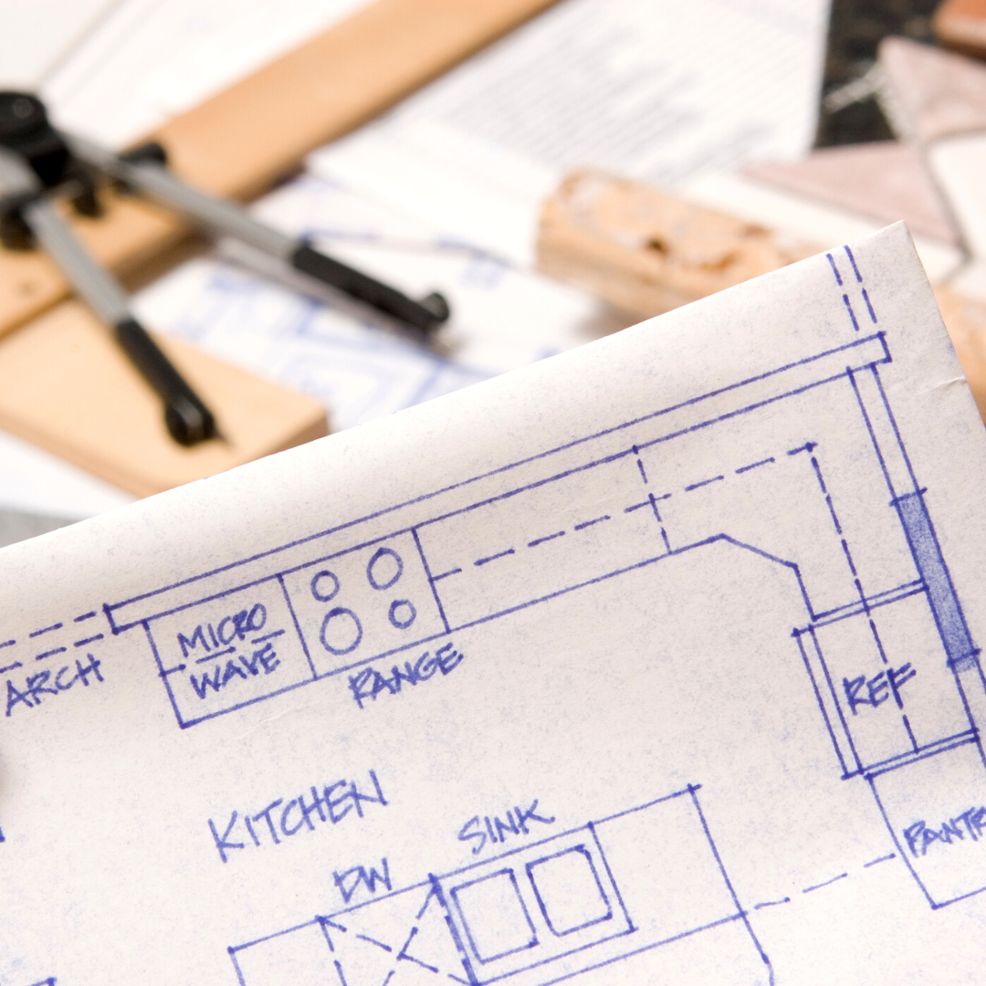 Blueprint sketch of a kitchen layout with labeled appliances and fixtures such as microwave, range, sink, and refrigerator.