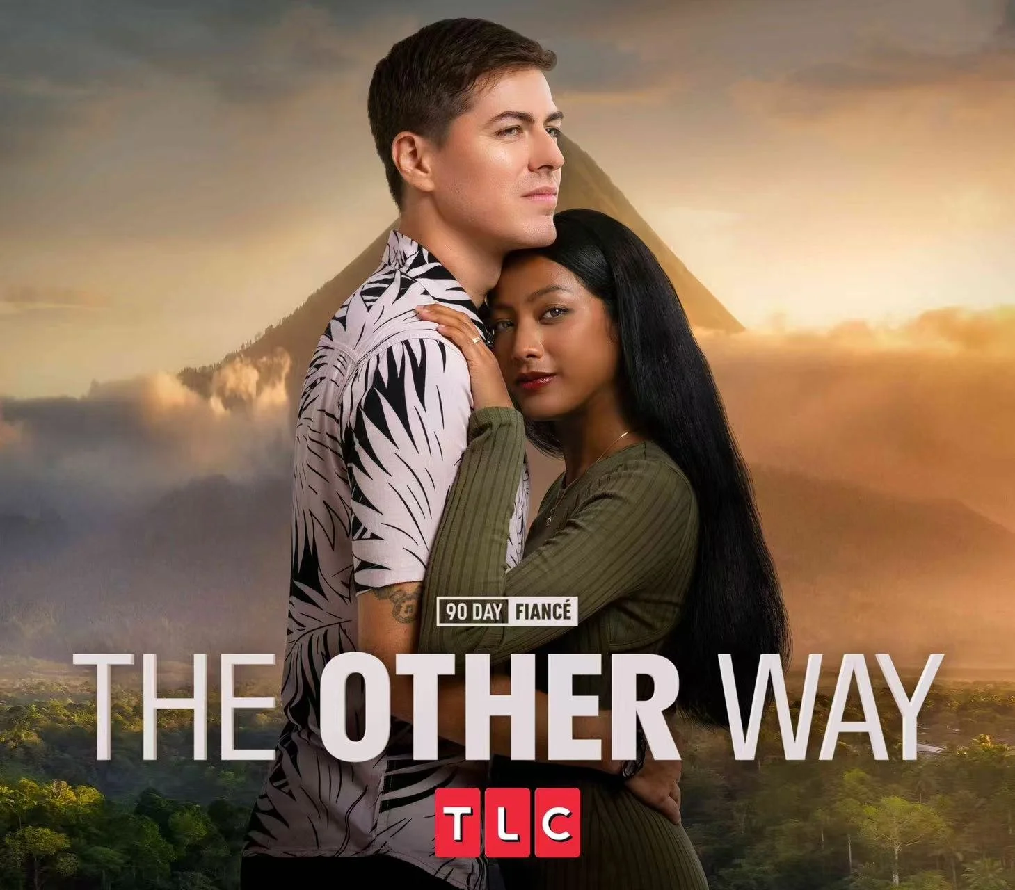 A man and woman embrace in front of a scenic mountain and cloud background, with the text 'The Other Way' and the TLC logo.