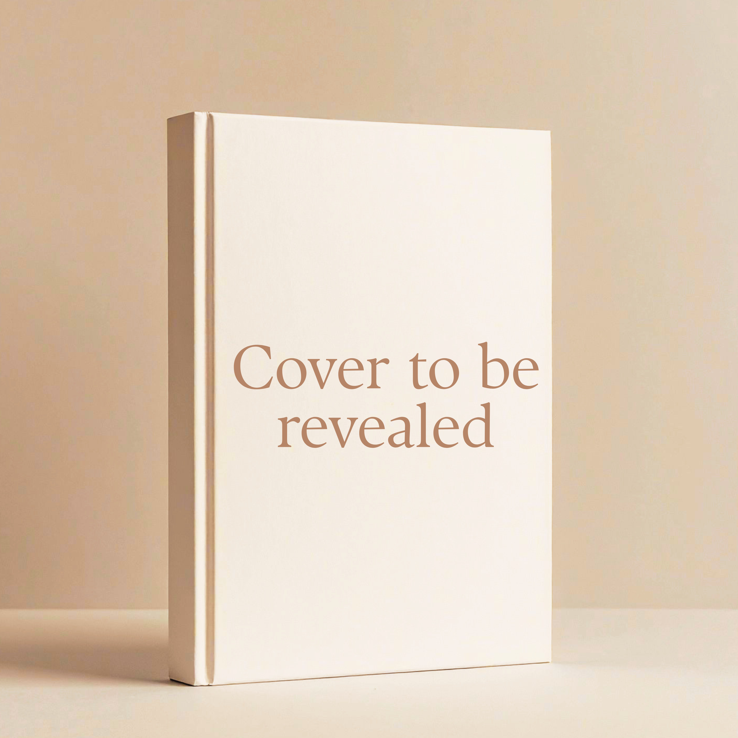 A white book with the text "Cover to be revealed" on it, placed against a light beige background.