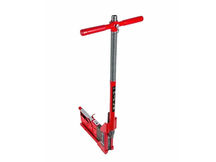 A red hydraulic floor jack used for lifting vehicles.