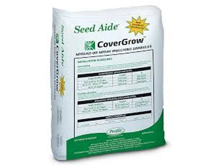 A white bag of Seed Aide CoverGrow, a fertilizer for spray application, featuring green and black text, a yellow starburst label, and a green curved design at the bottom.