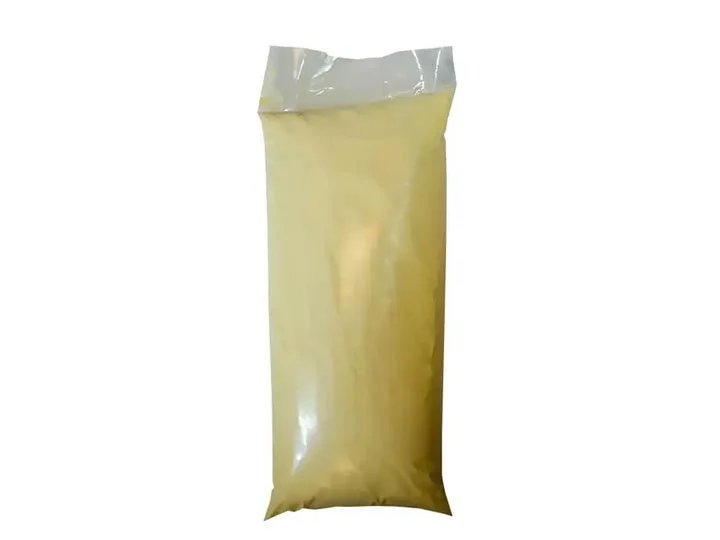 Plastic bag filled with yellow powder or granular substance.