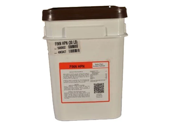 A white plastic container with a dark brown lid, labeled as Finn HPN, used for herbicide or chemical storage.