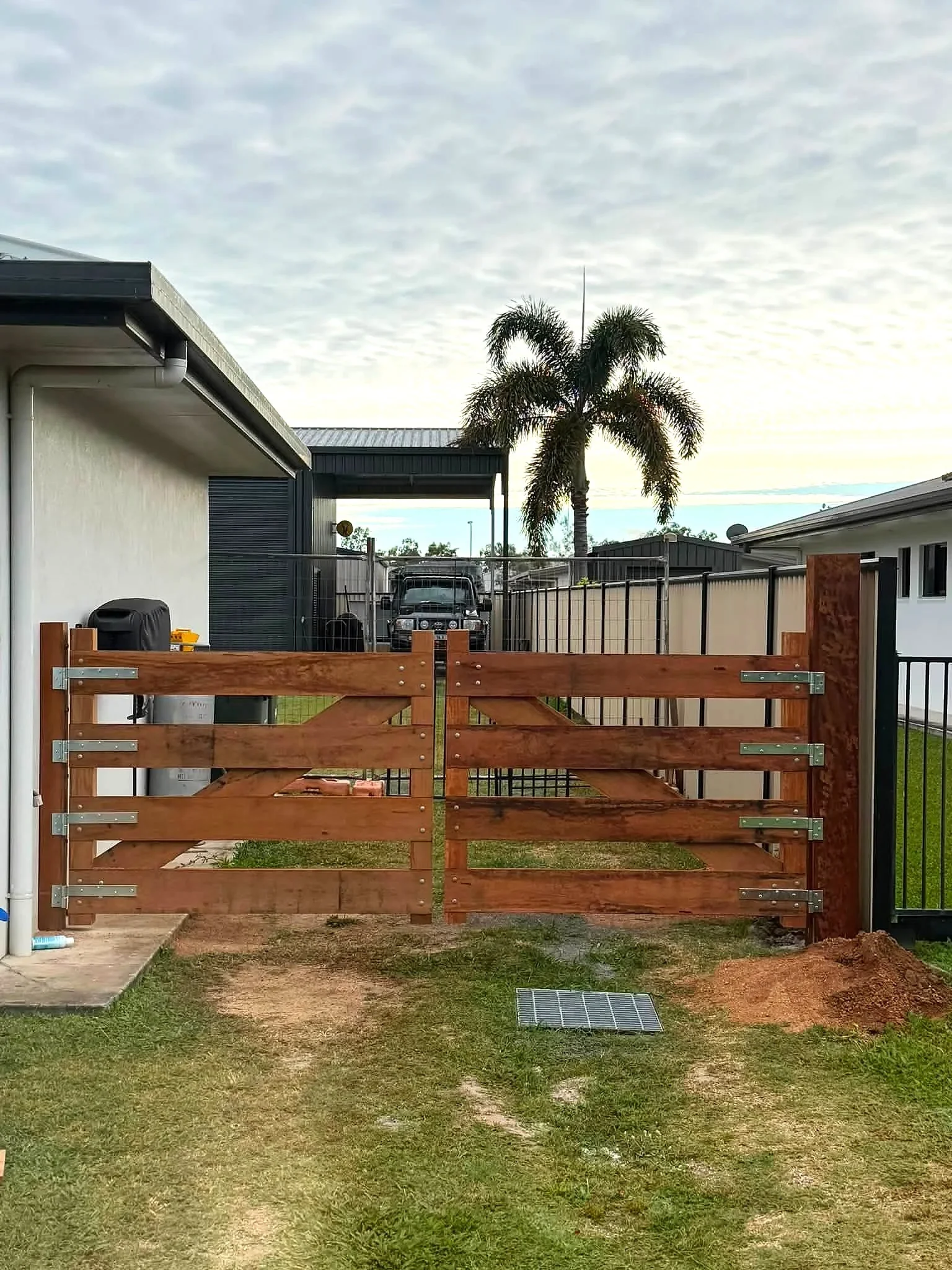 Timber paling fence installation by FNQ Concrete & Earthmoving