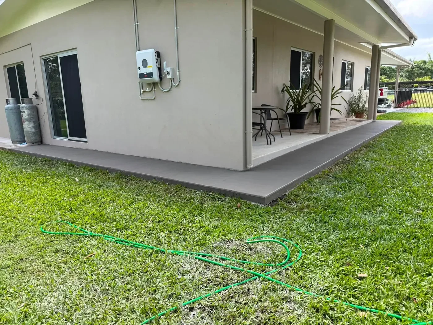 Concrete path installed around a home on the Atherton Tablelands.