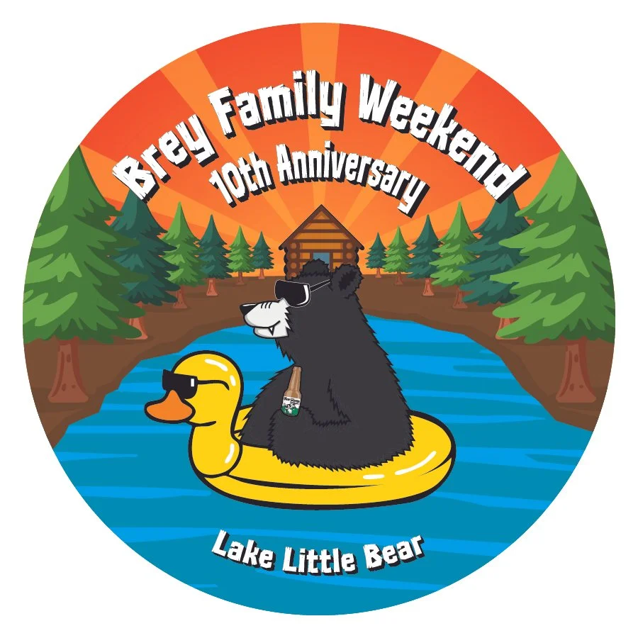 A circular illustration with a bear and duck on a lake, surrounded by pine trees and a log cabin, celebrating the 10th anniversary of the Brey Family Weekend. The bear is wearing sunglasses and holding a drink, sitting on a yellow duck float with sunglasses. There is text at the top and bottom of the circle.