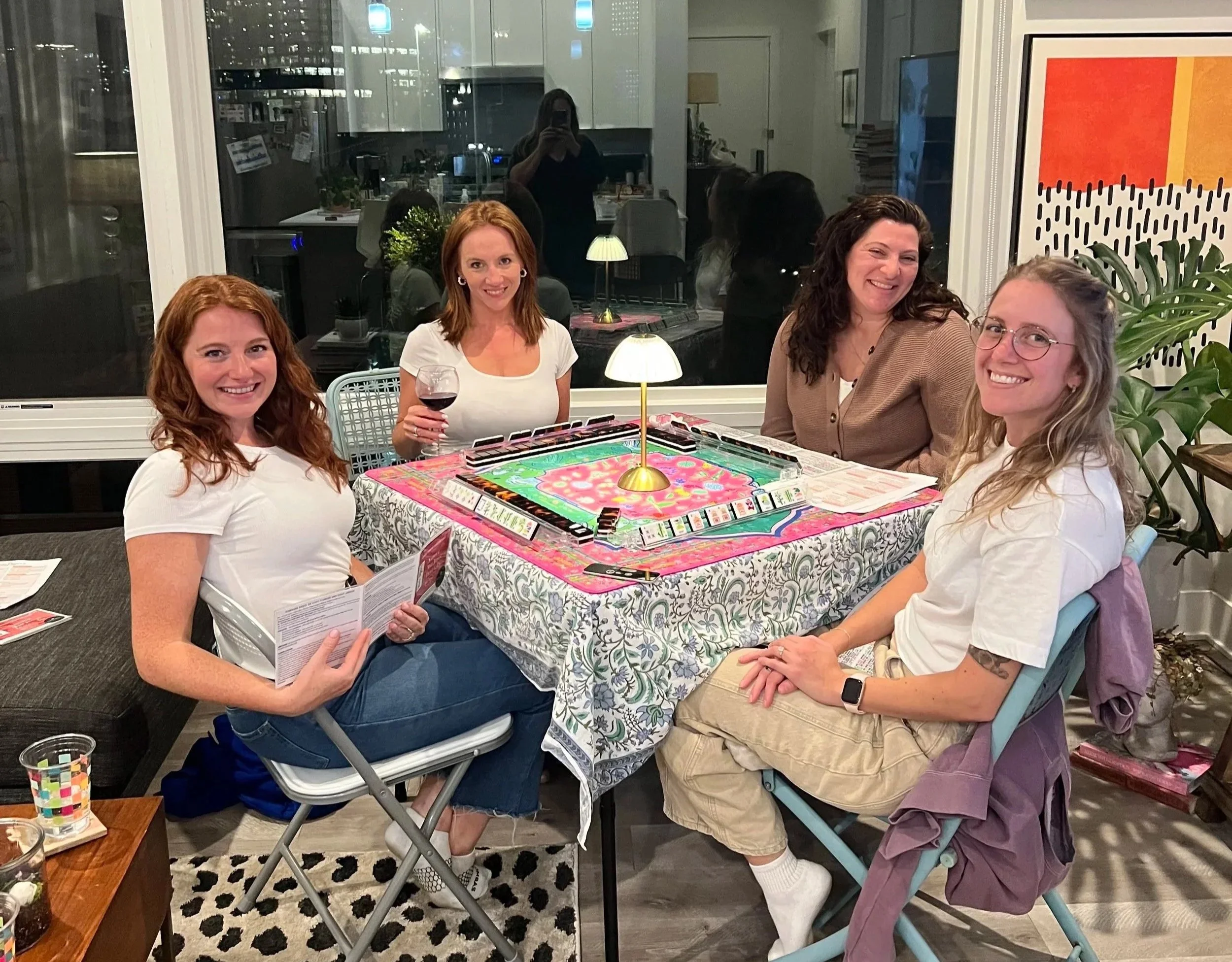 Guests enjoying a private American Mahjong party hosted by Mahj & Mingle in Chicago.