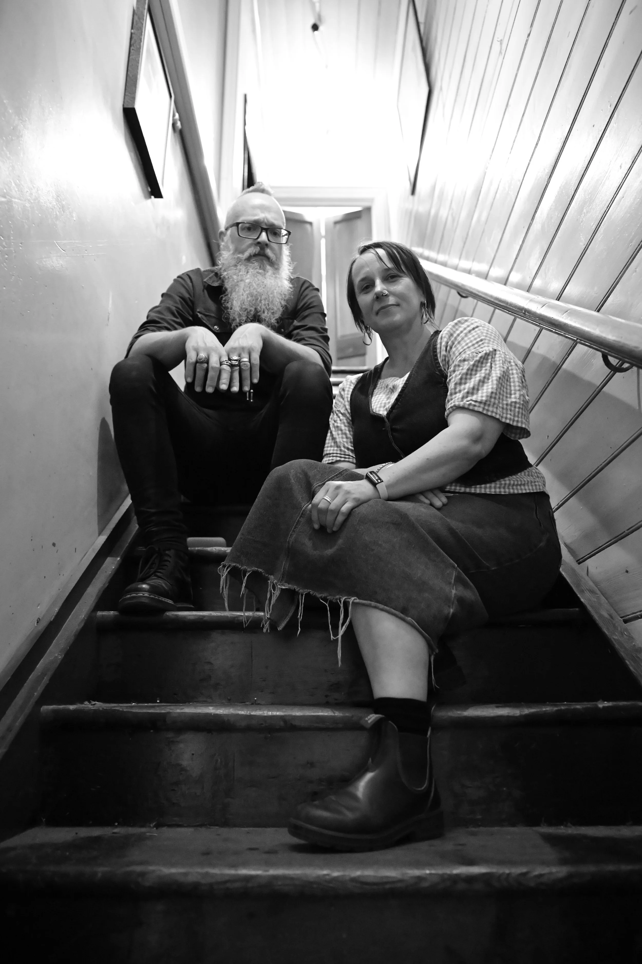 Photo by Tashi Hill Photography One Part Gin Sam Bell and Holly Sewell sitting on the stairs of Odessa's in Creswick