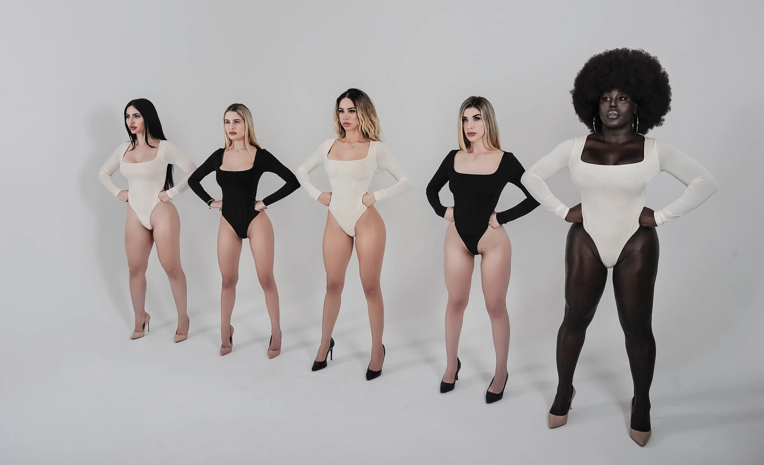 Diverse women modeling results-focused laser hair removal and body treatments