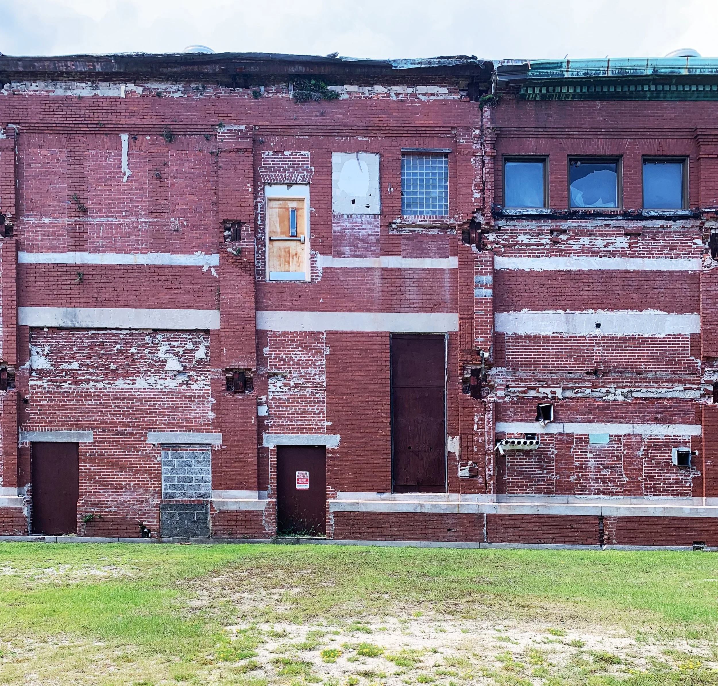 Storehouse 9 existing brick building exterior prior to adaptive reuse in Atlanta