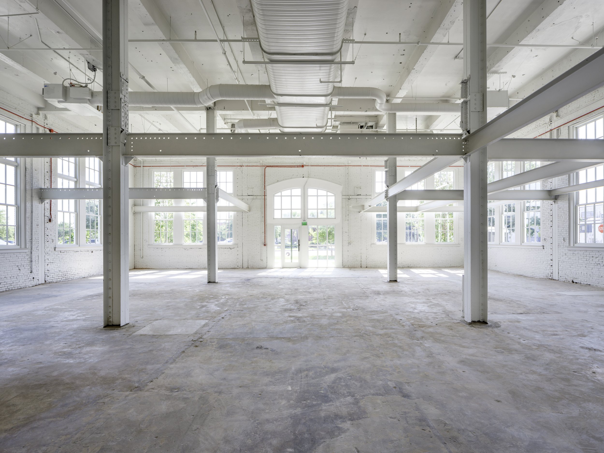 Storehouse 9 interior showing existing structure and open industrial space before renovation