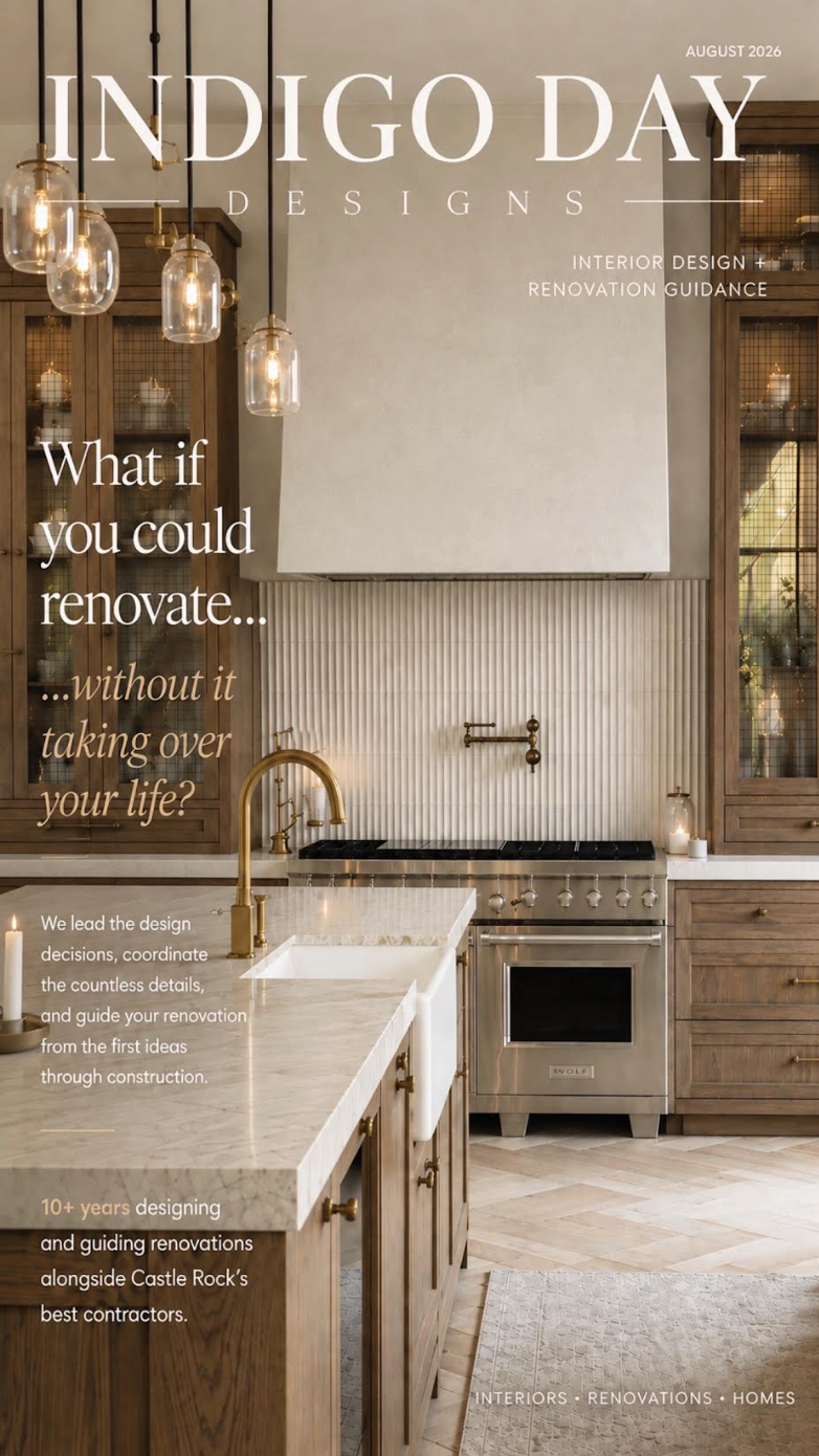 A modern kitchen with wooden cabinets, a marble countertop island with an undermount sink, a stainless steel stove, hanging pendant lights, and decorative candles.