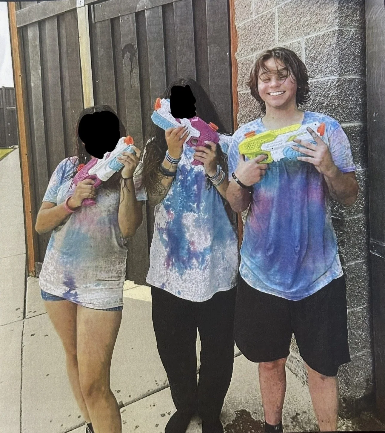 Julia Castellano during an event that involved spraying each other with colored water.