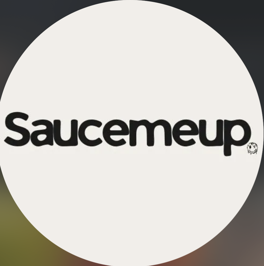 The word 'Saucemeup' in bold black letters on a white circle background with a small cartoon face in the bottom right corner.