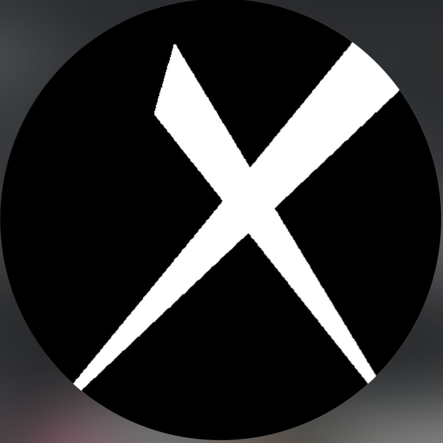A black circle with a white stylized 'X' in the center.
